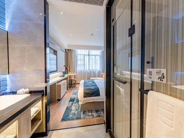 Bed in Echarm Hotel Yunmeng Mengze Lake Branch