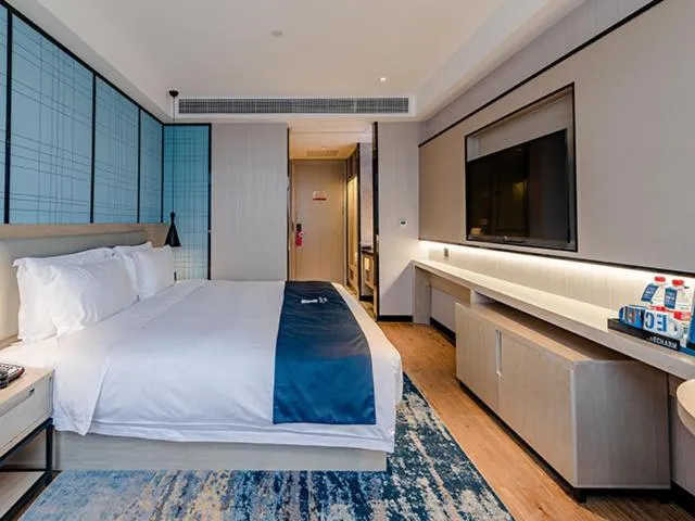 Bed in Echarm Hotel Yunmeng Mengze Lake Branch