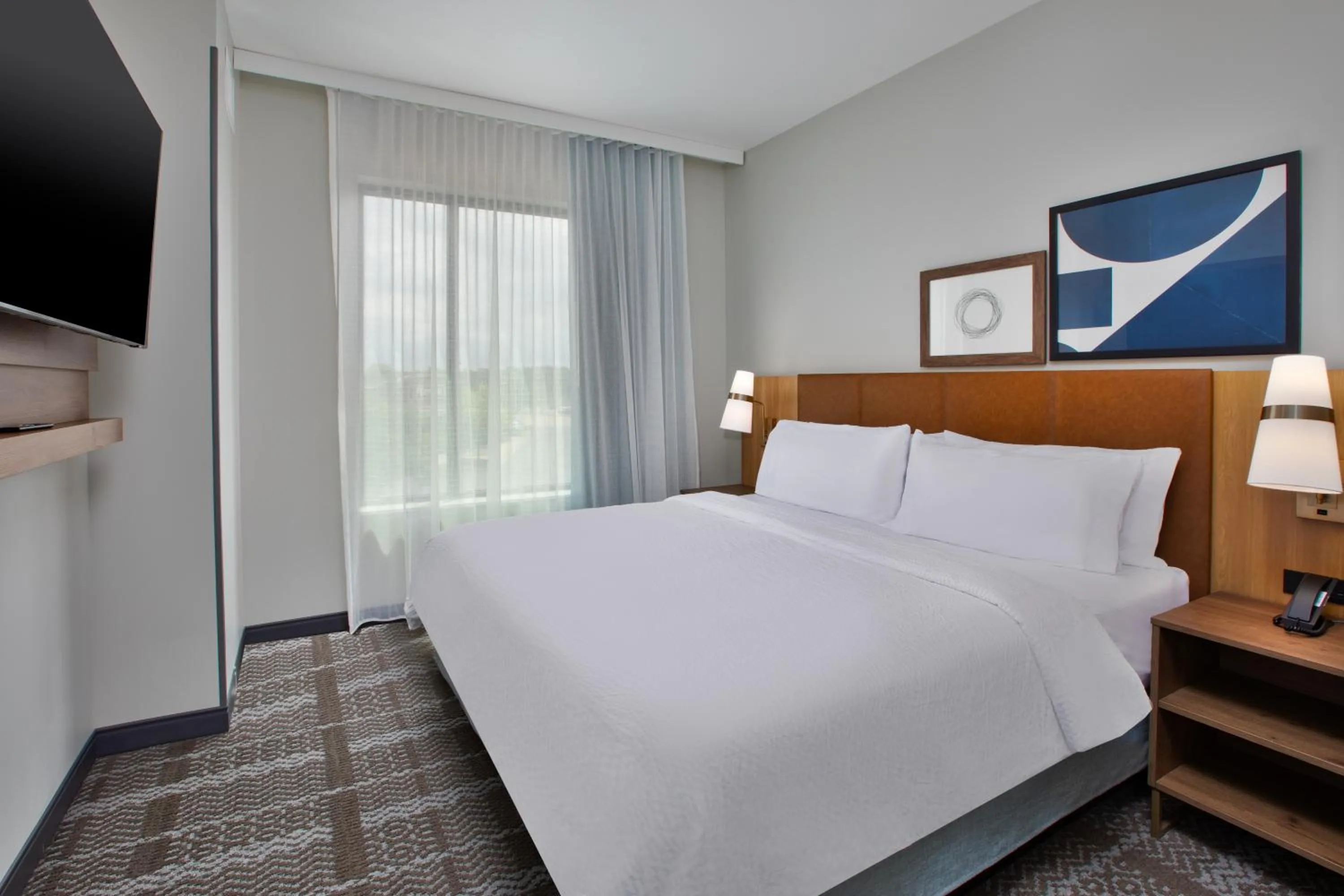 Bed in Staybridge Suites Grand Rapids South by IHG