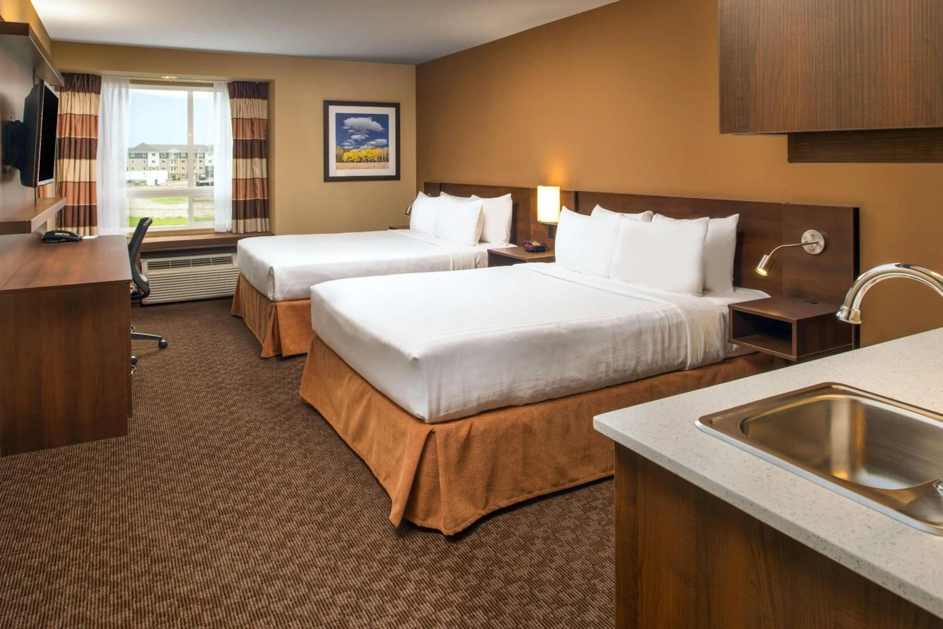 Photo of the whole room, Bed in Microtel Inn & Suites by Wyndham Red Deer