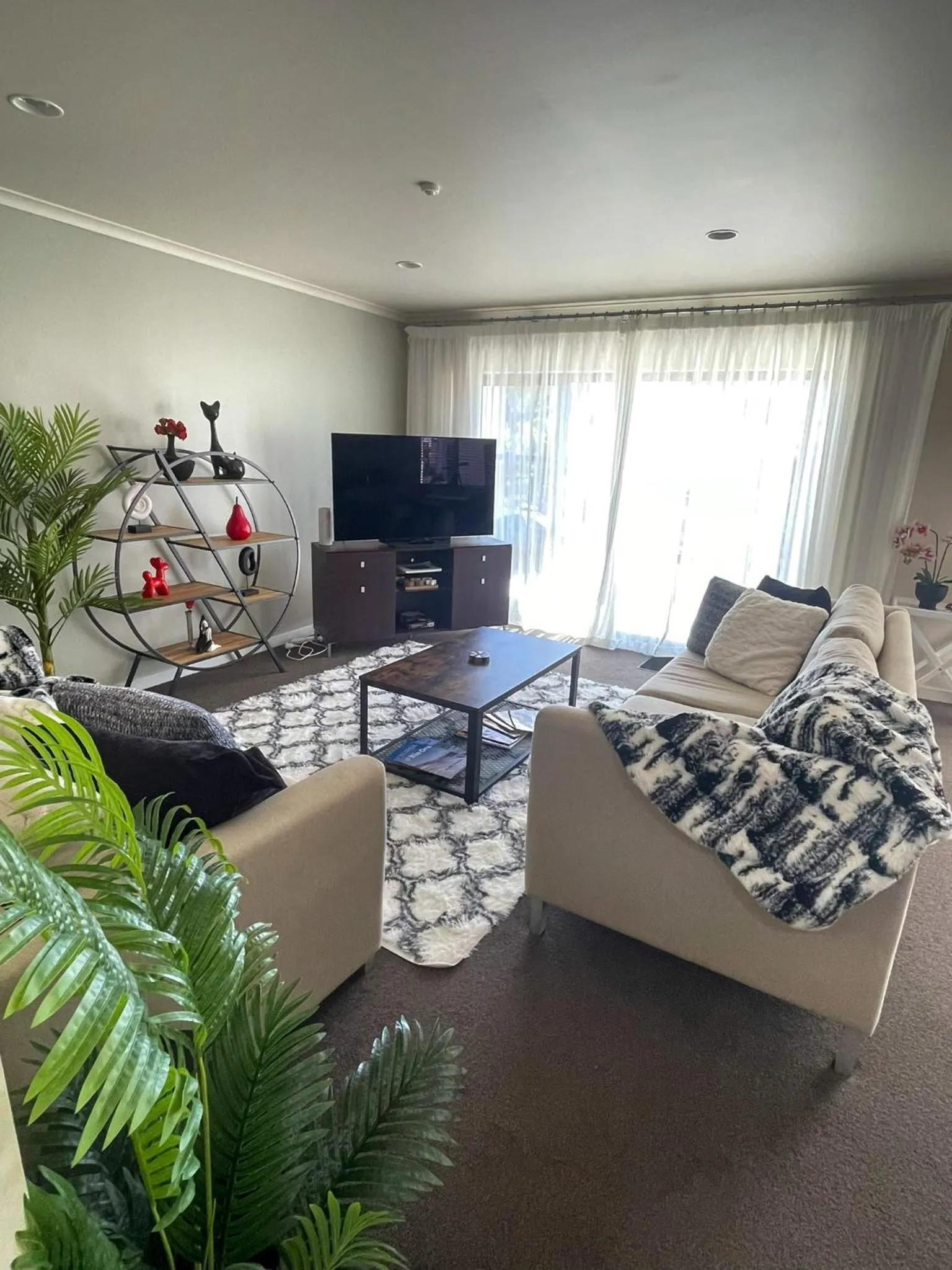 Living room in Ocean Breeze Resort Pauanui