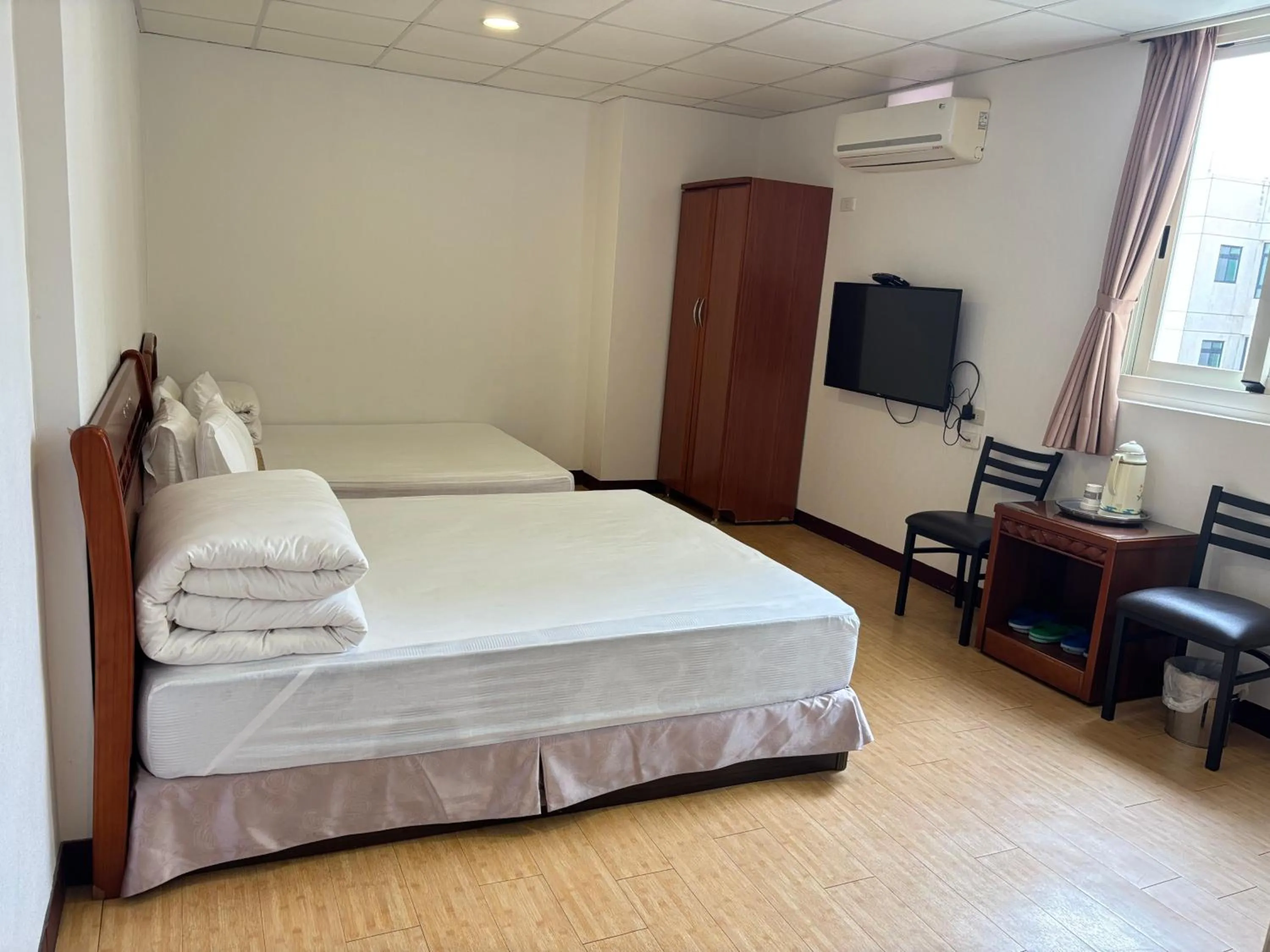 Bed in Chantai Hotel