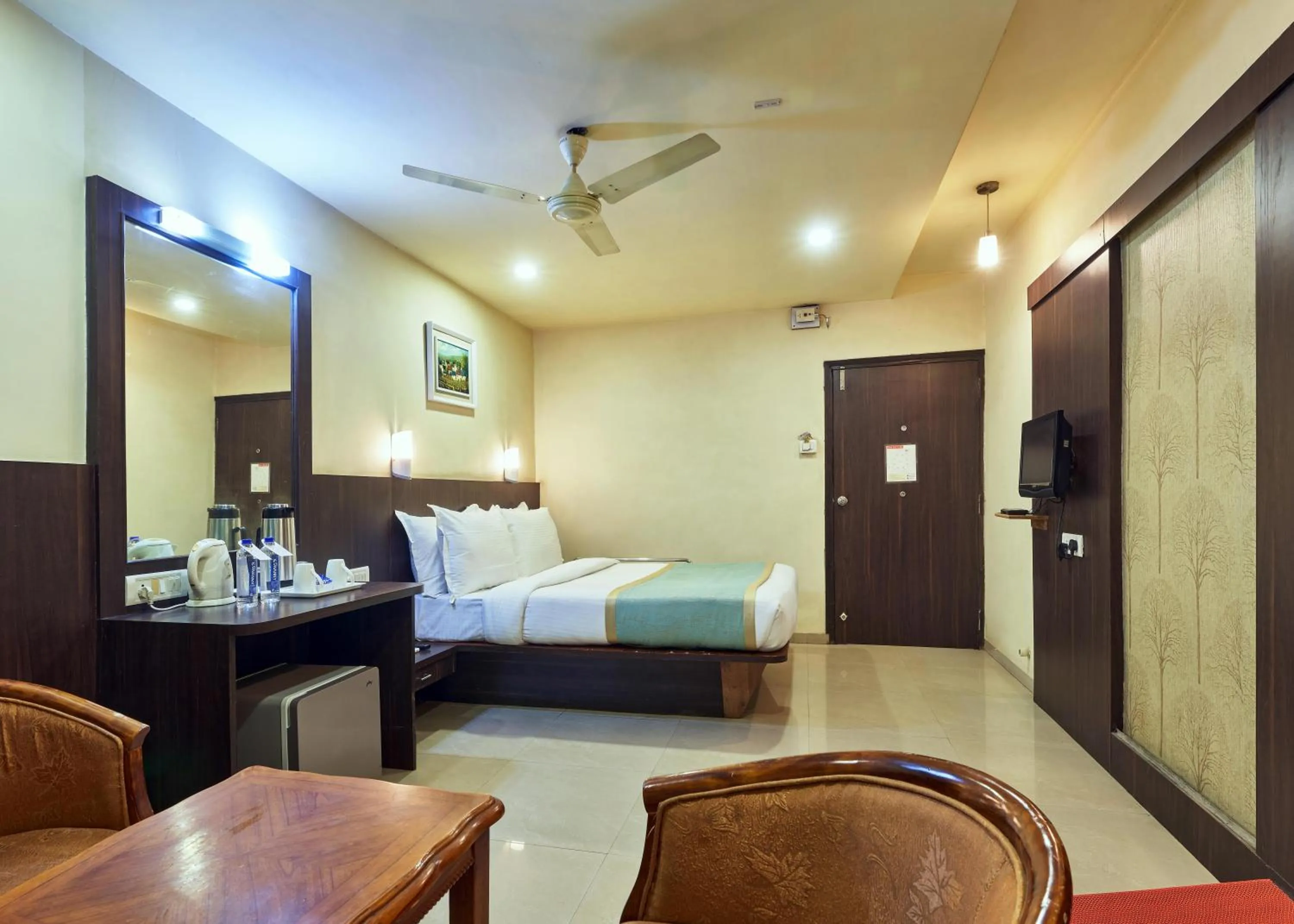 Photo of the whole room, Bed in Hotel Atria, Kolhapur