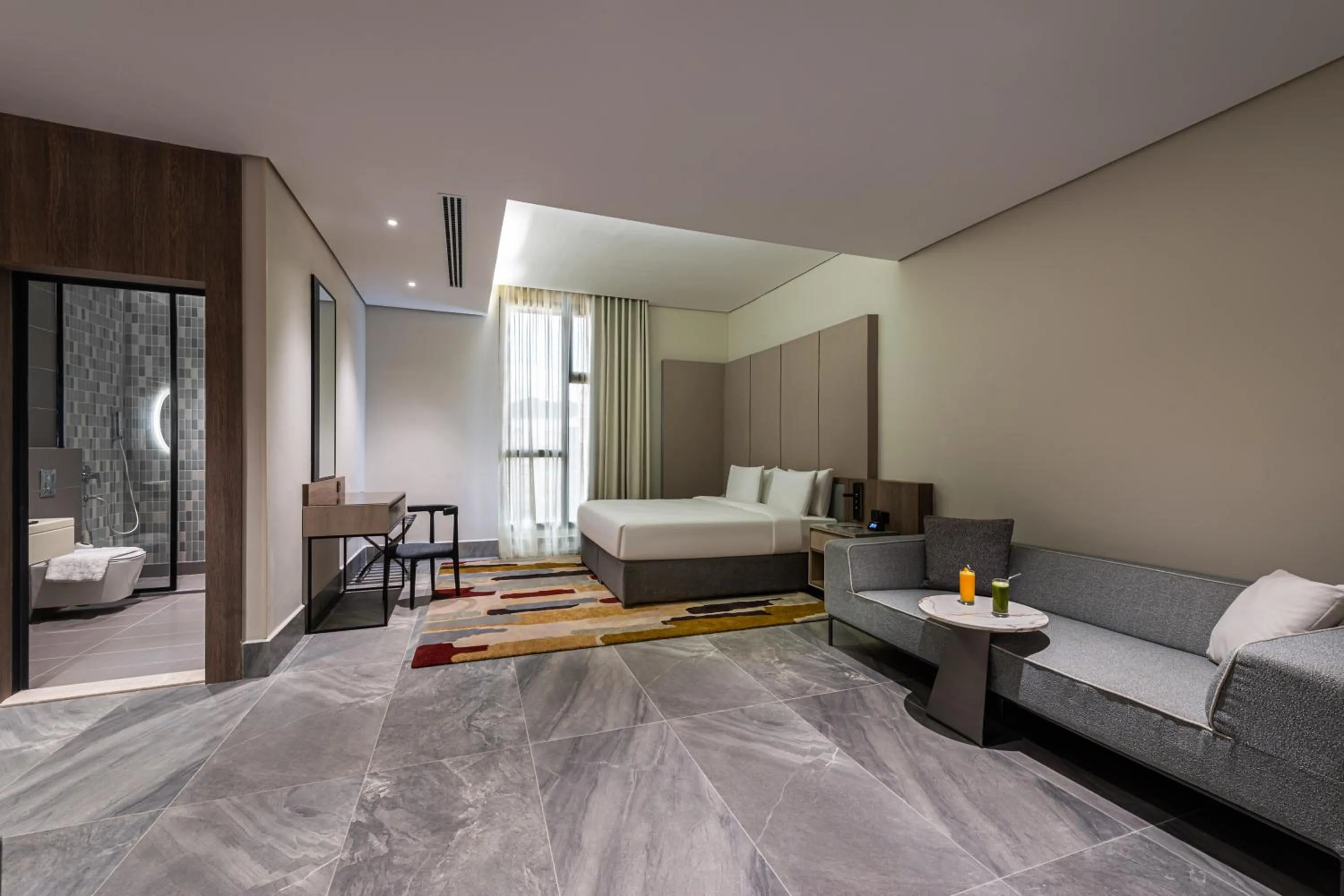 Living room, Bed in Ewaa Express Hotel - Abha