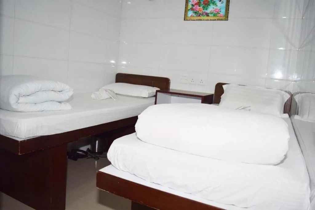 Bed in Om Guest House