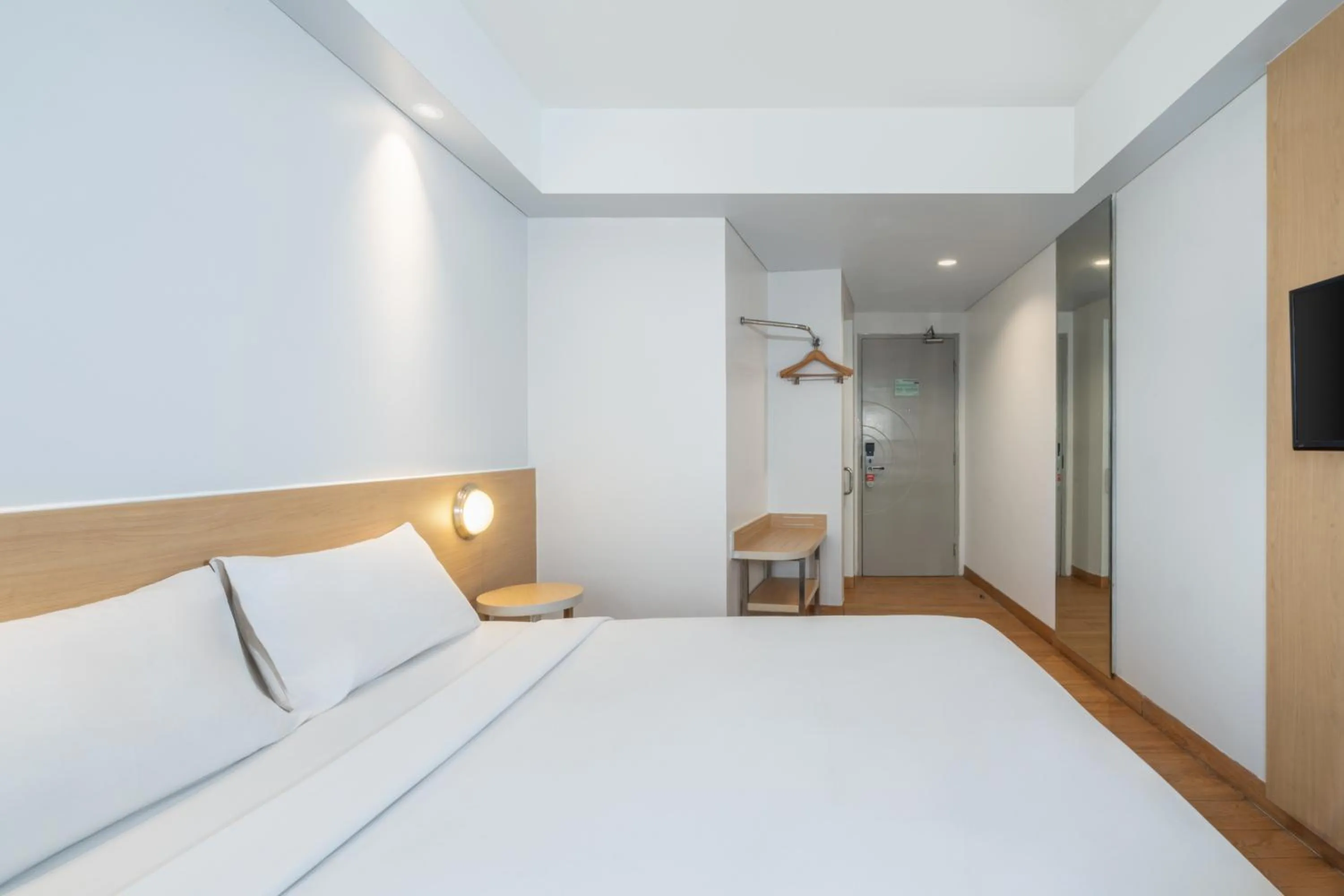 Bed in Indies Style Malioboro Hotel