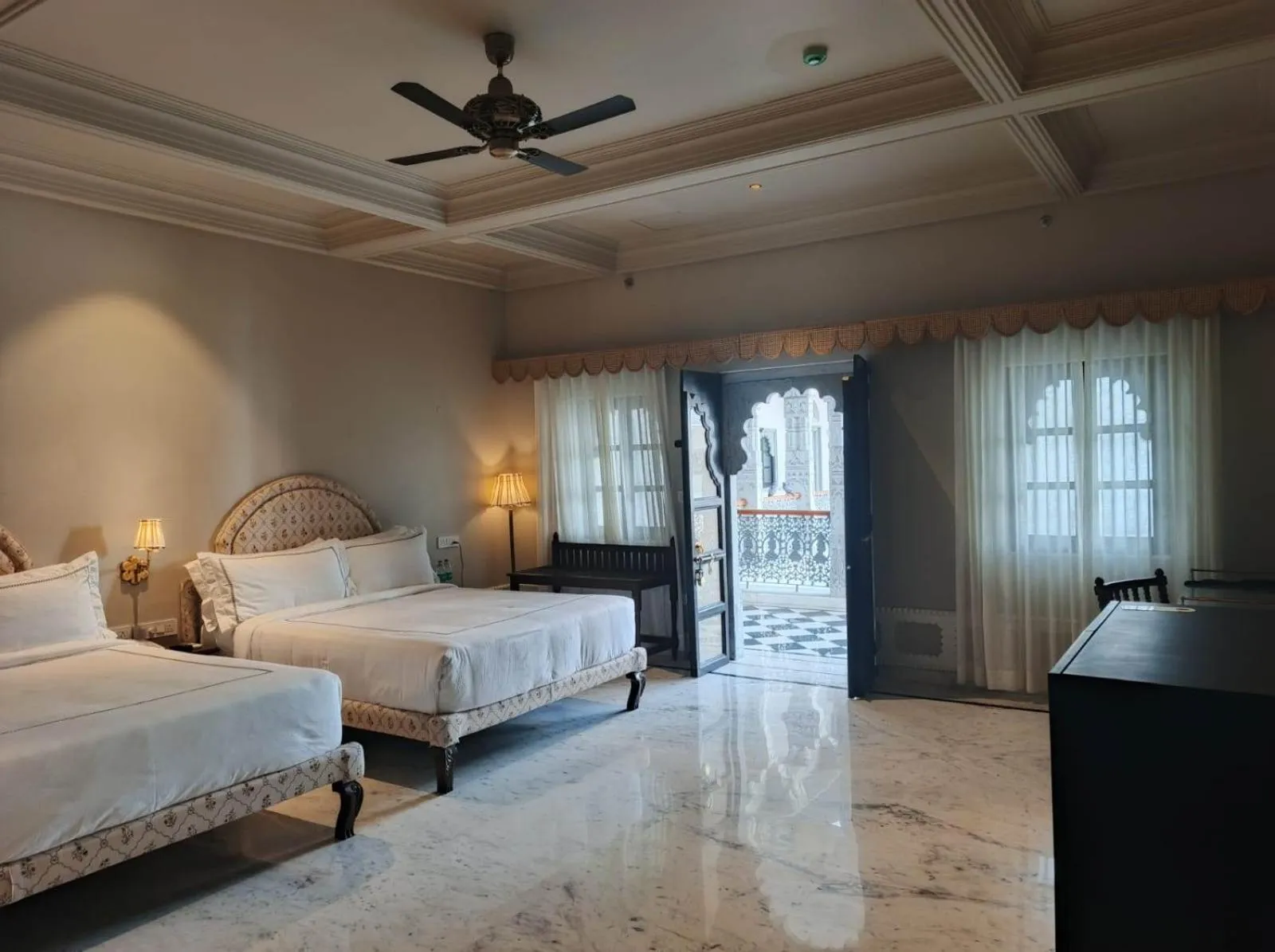 Bed in Daulatgarh Resort