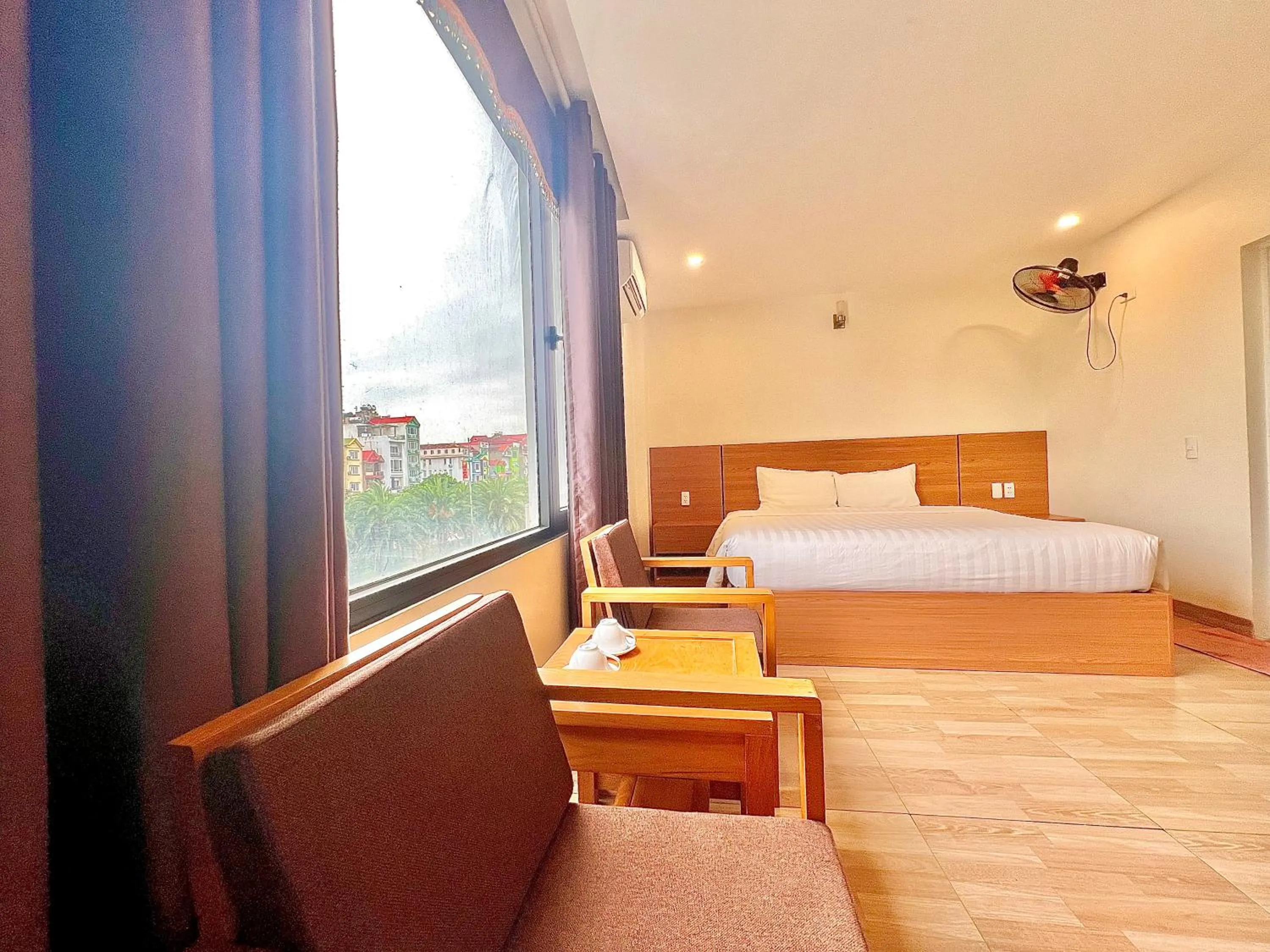 Seating area, Bed in Dragon Airport Hotel