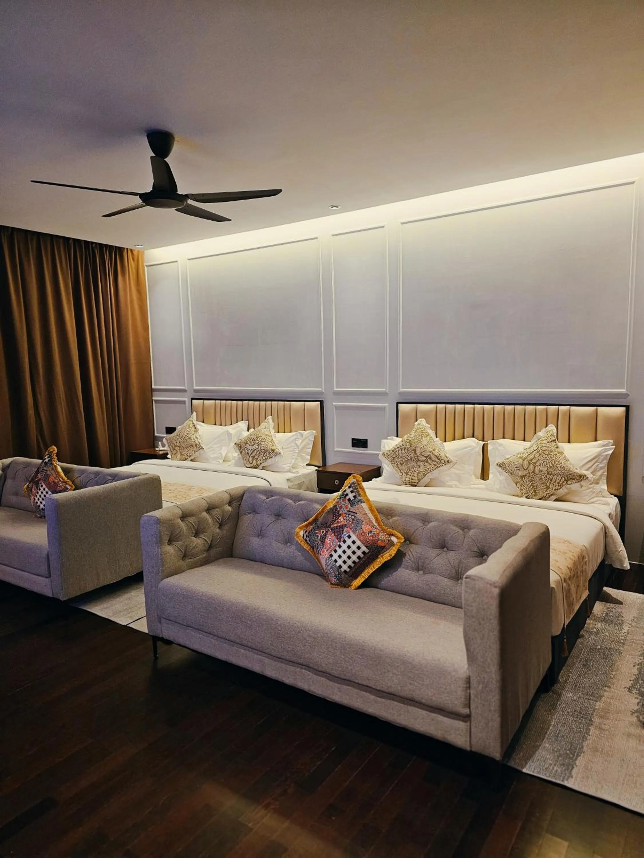 Bed in The Palm Suite at Lava Mansion