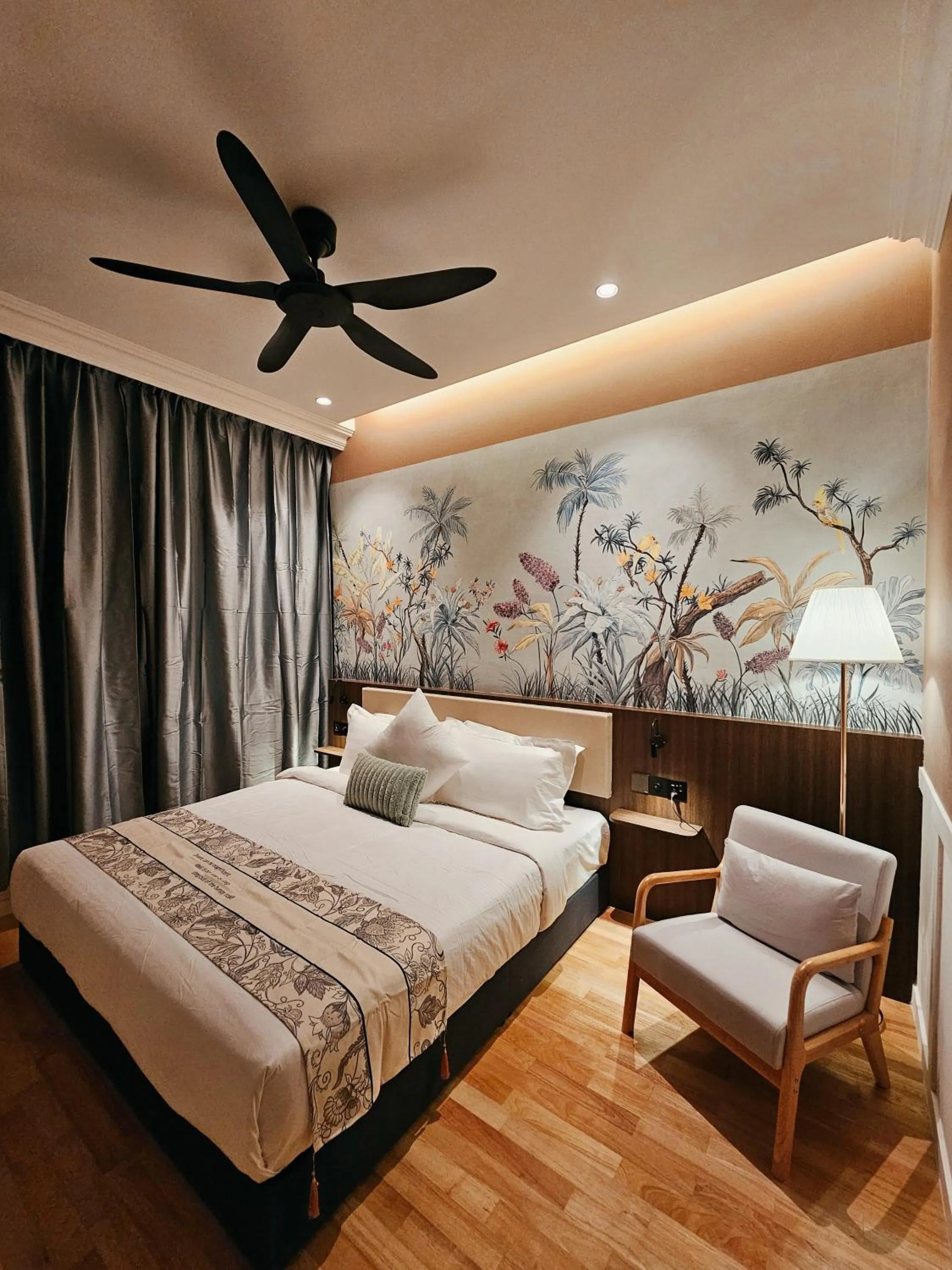 Bed in The Palm Suite at Lava Mansion