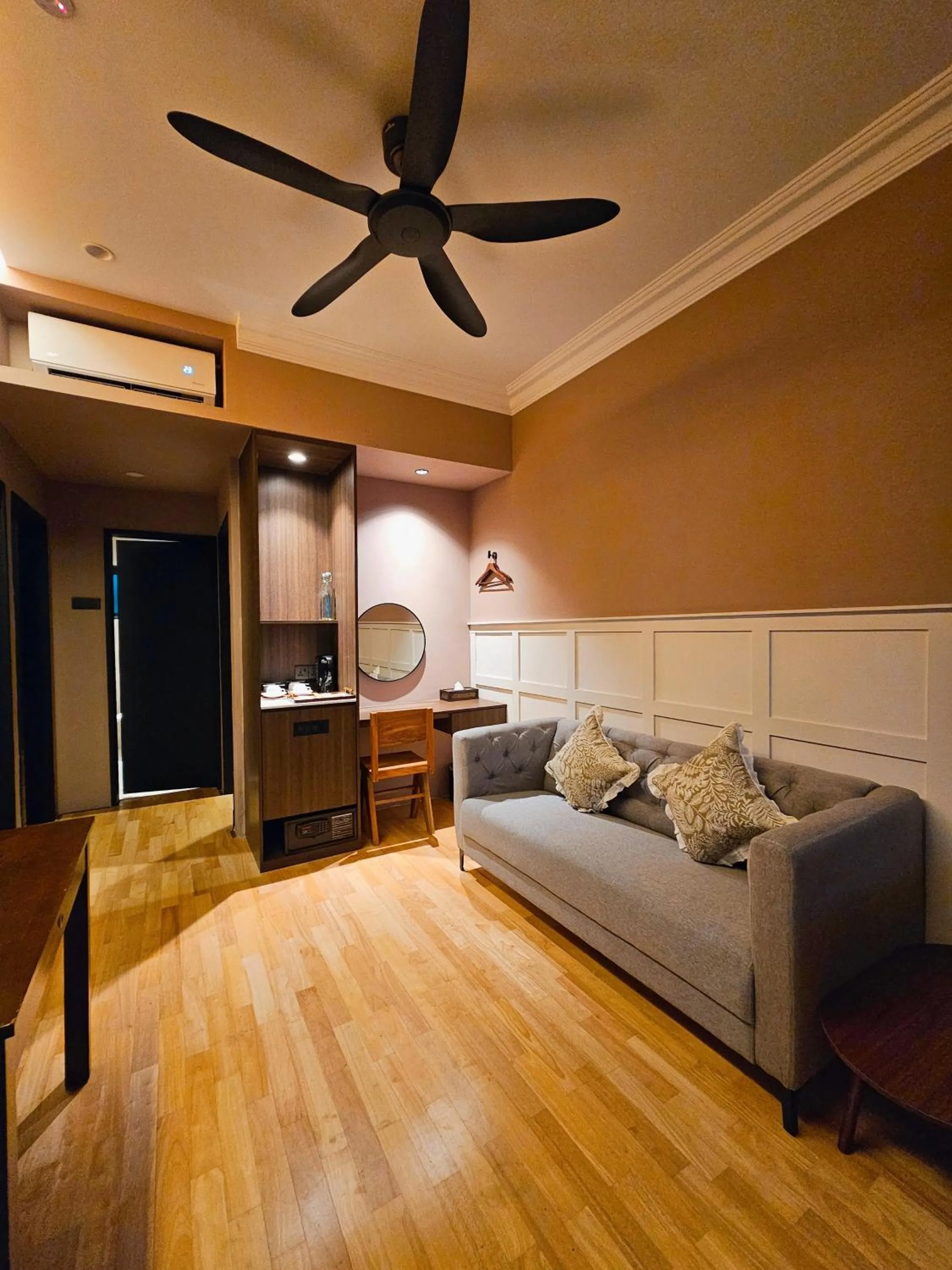 Bed in The Palm Suite at Lava Mansion