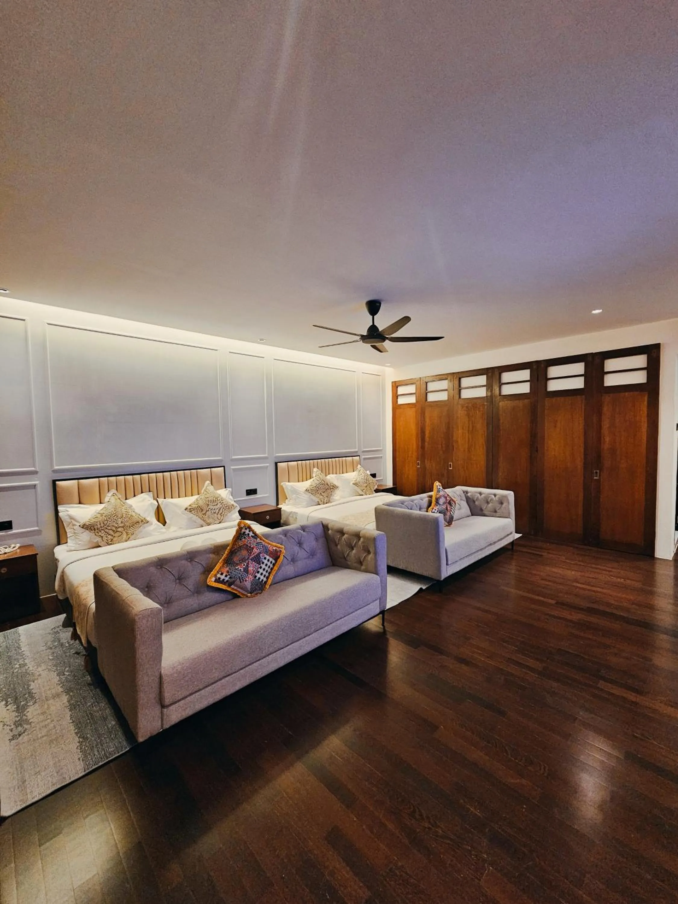 Bed in The Palm Suite at Lava Mansion