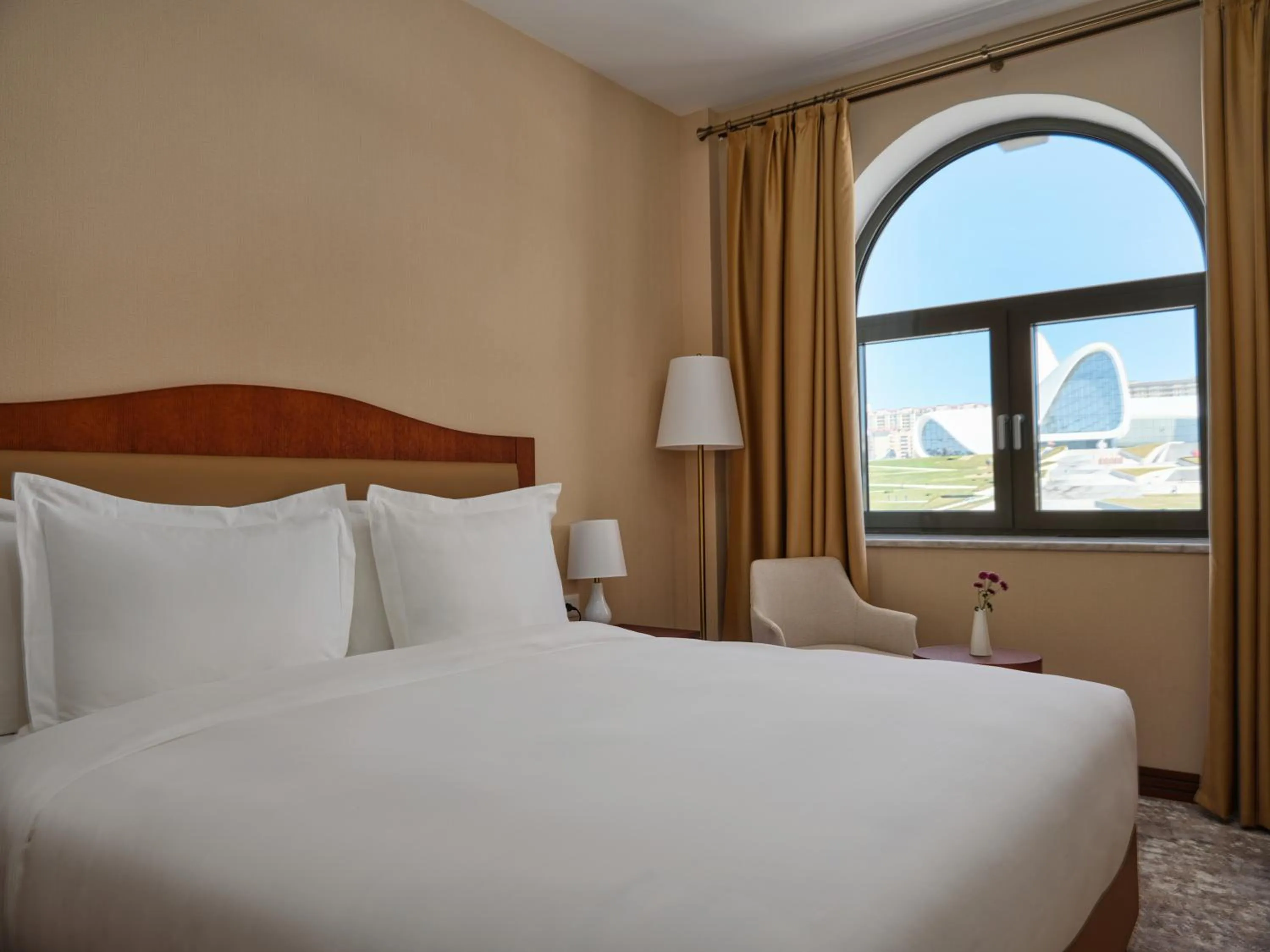 Bed in The Central Point Hotel Baku