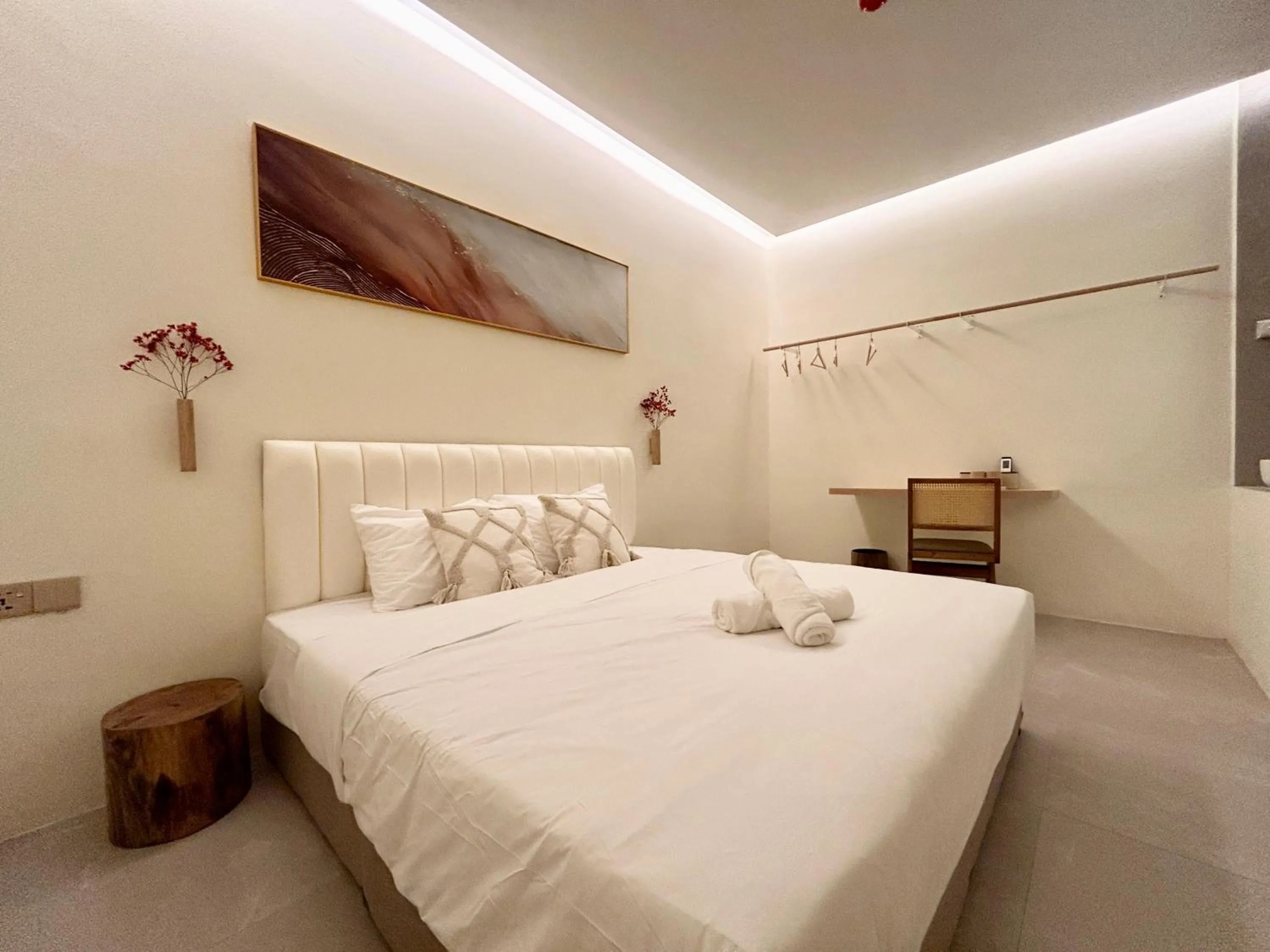 Bed in ONE18 Boutique Hotel