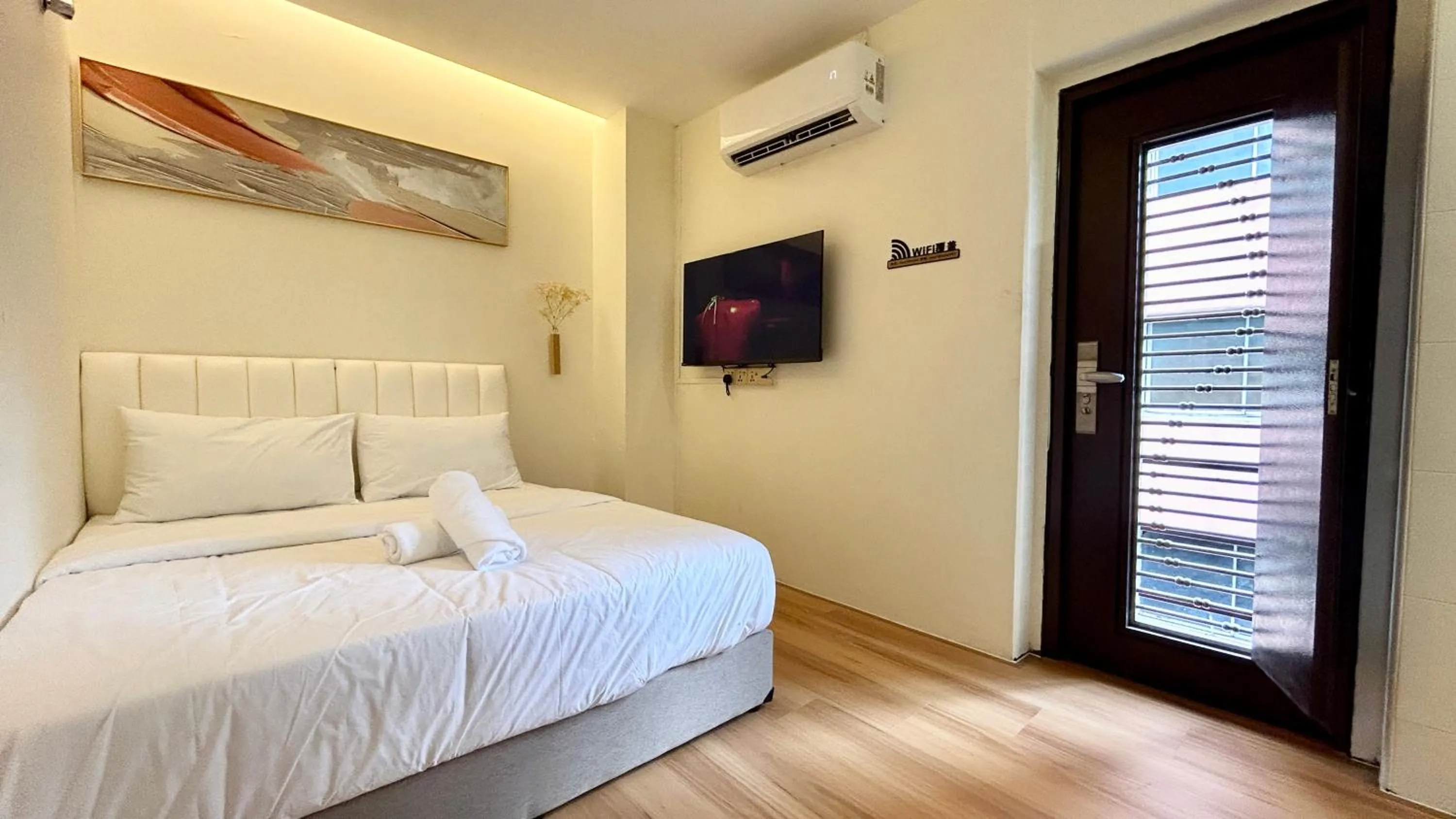 Bed in ONE18 Boutique Hotel