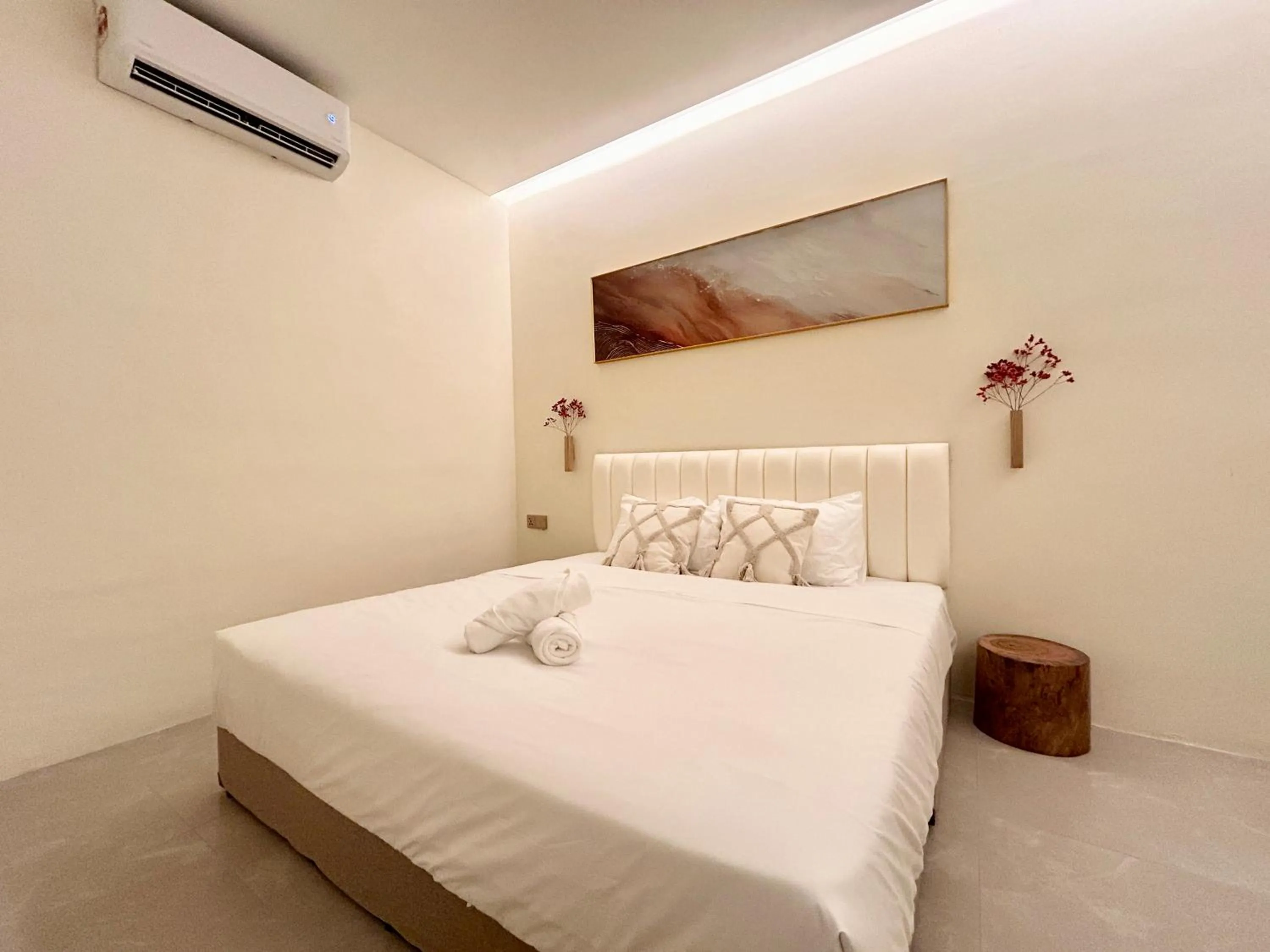 Bed in ONE18 Boutique Hotel