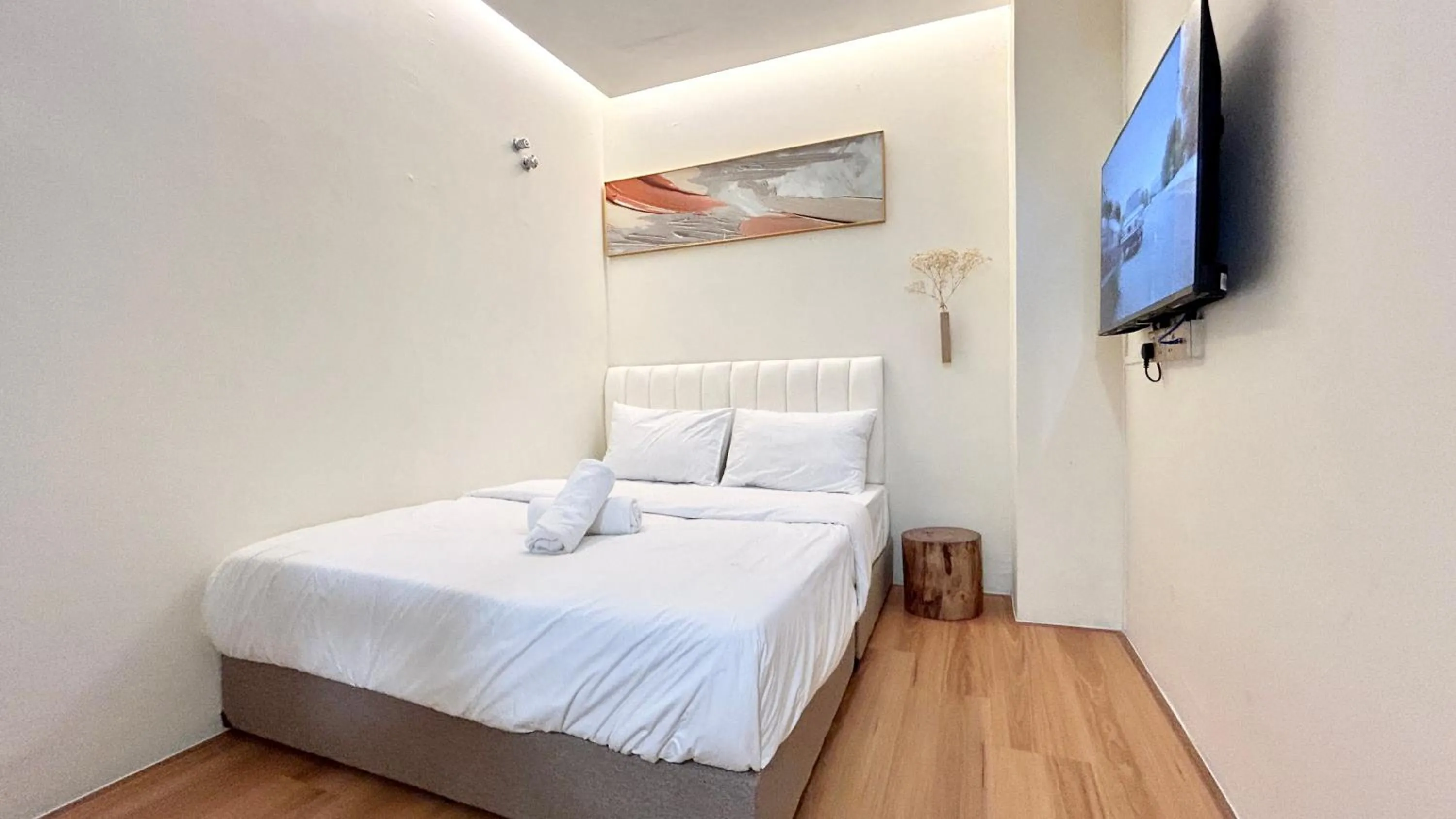 Bed in ONE18 Boutique Hotel