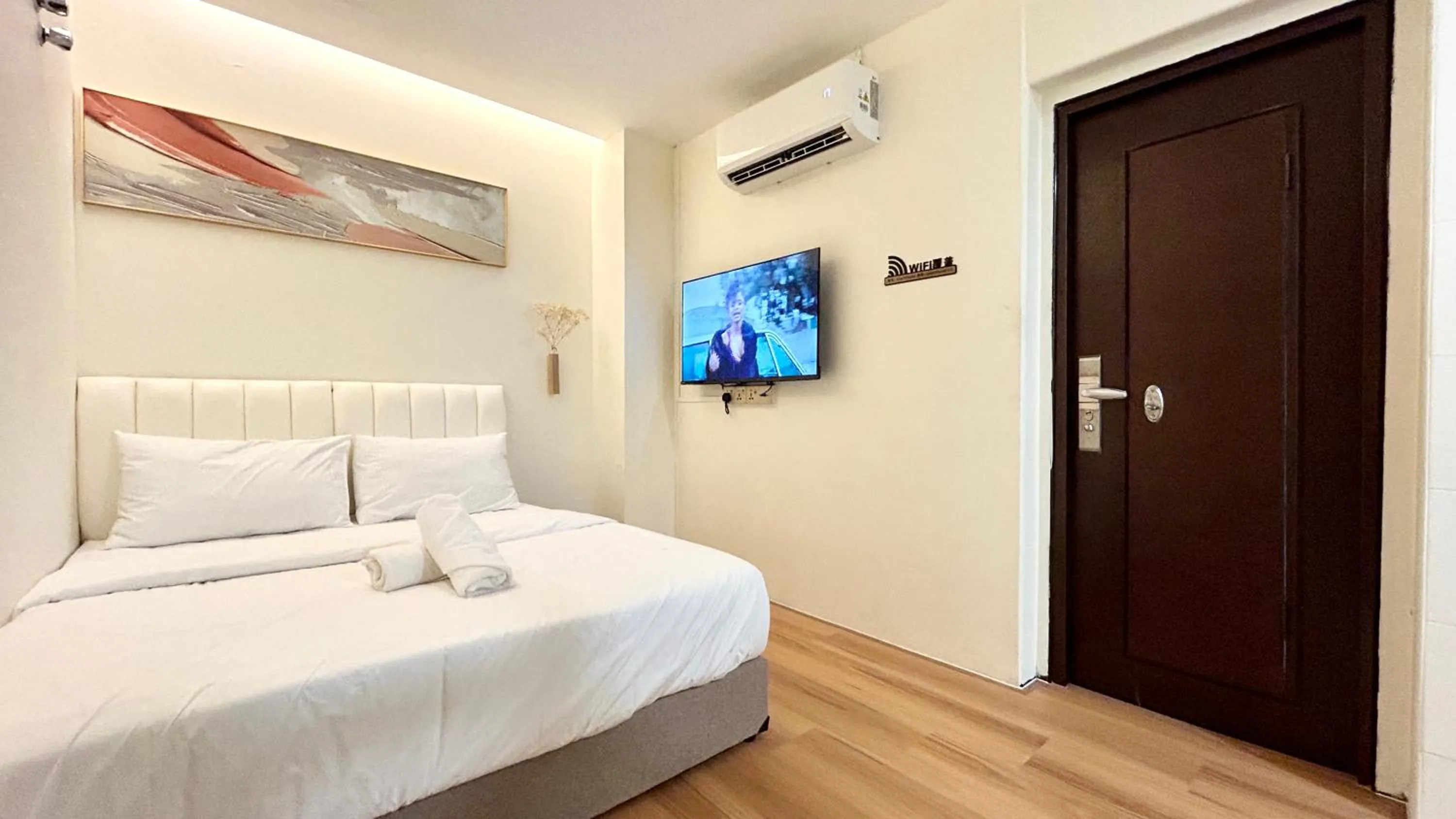 Bed in ONE18 Boutique Hotel