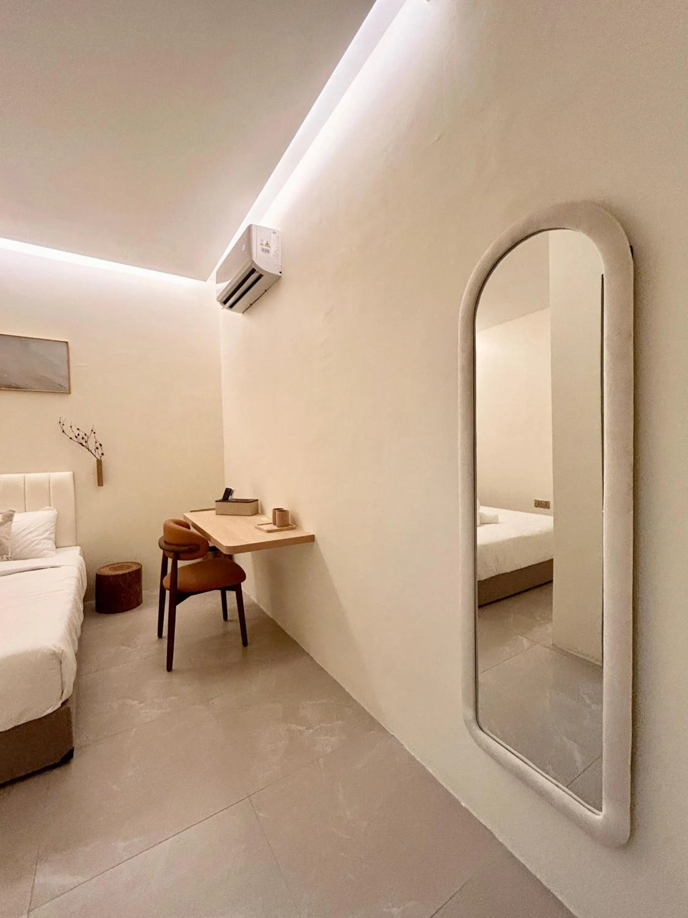 Bed in ONE18 Boutique Hotel