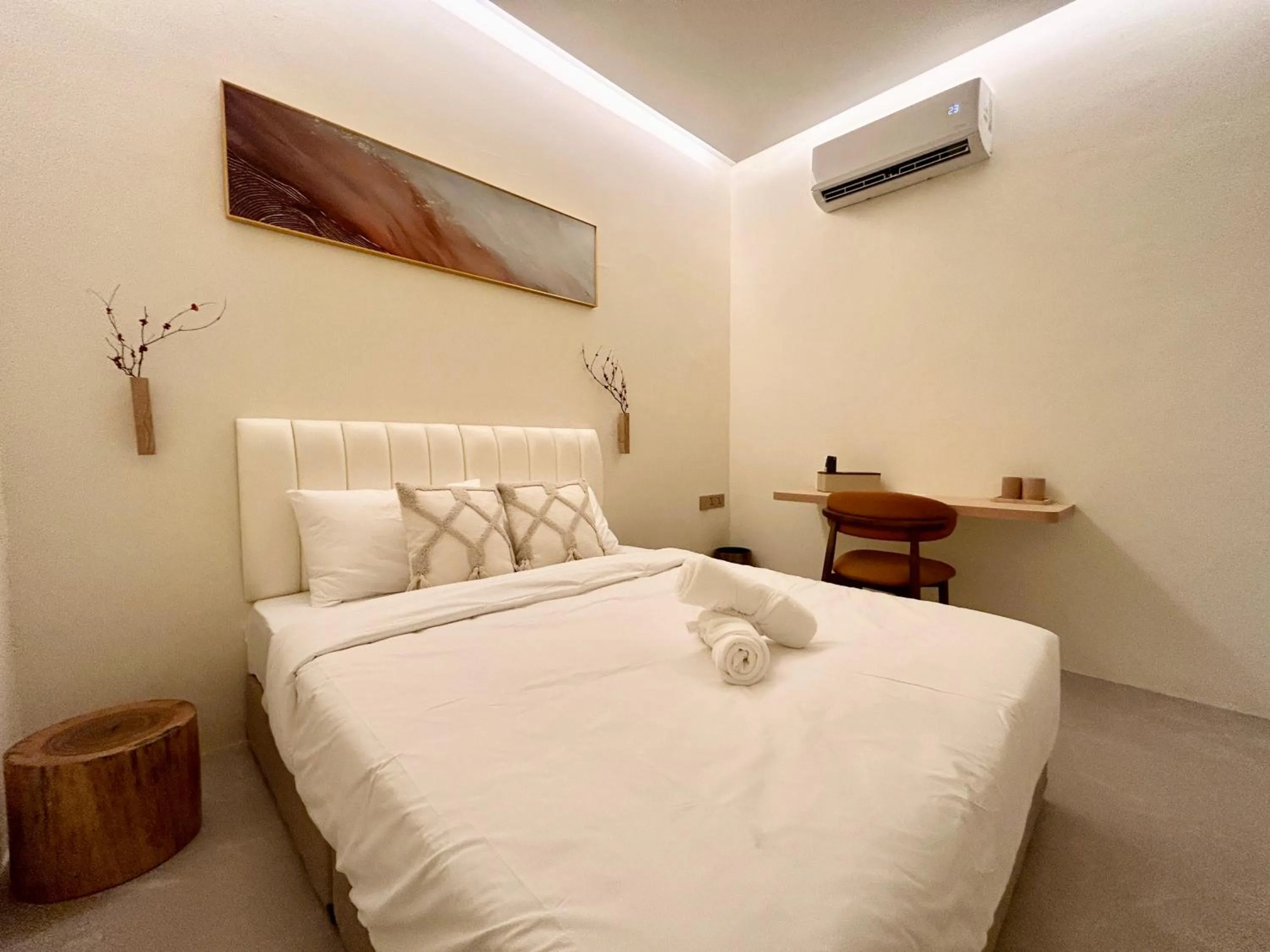 Bed in ONE18 Boutique Hotel