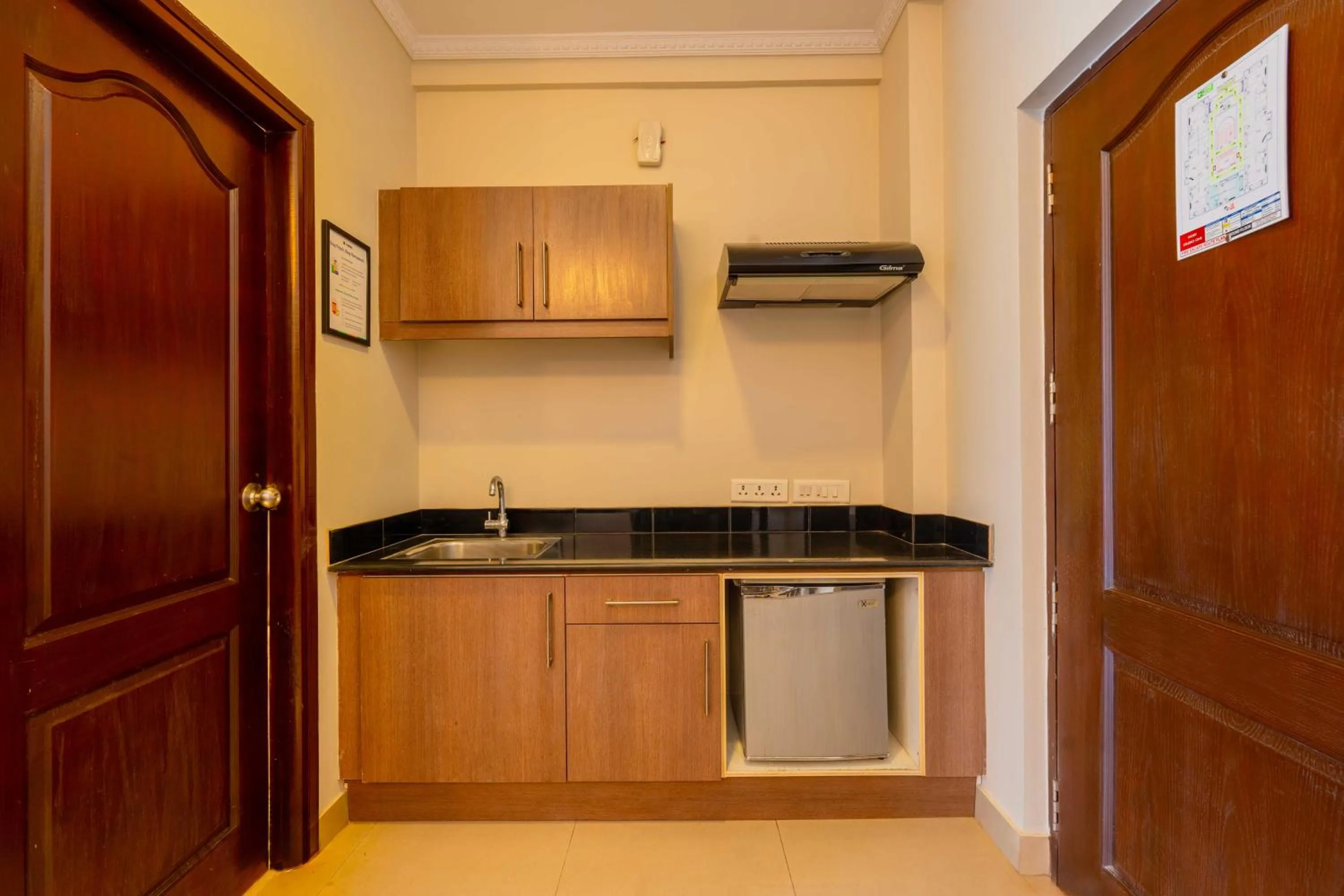 Kitchen or kitchenette in Treebo Ivory White Inn