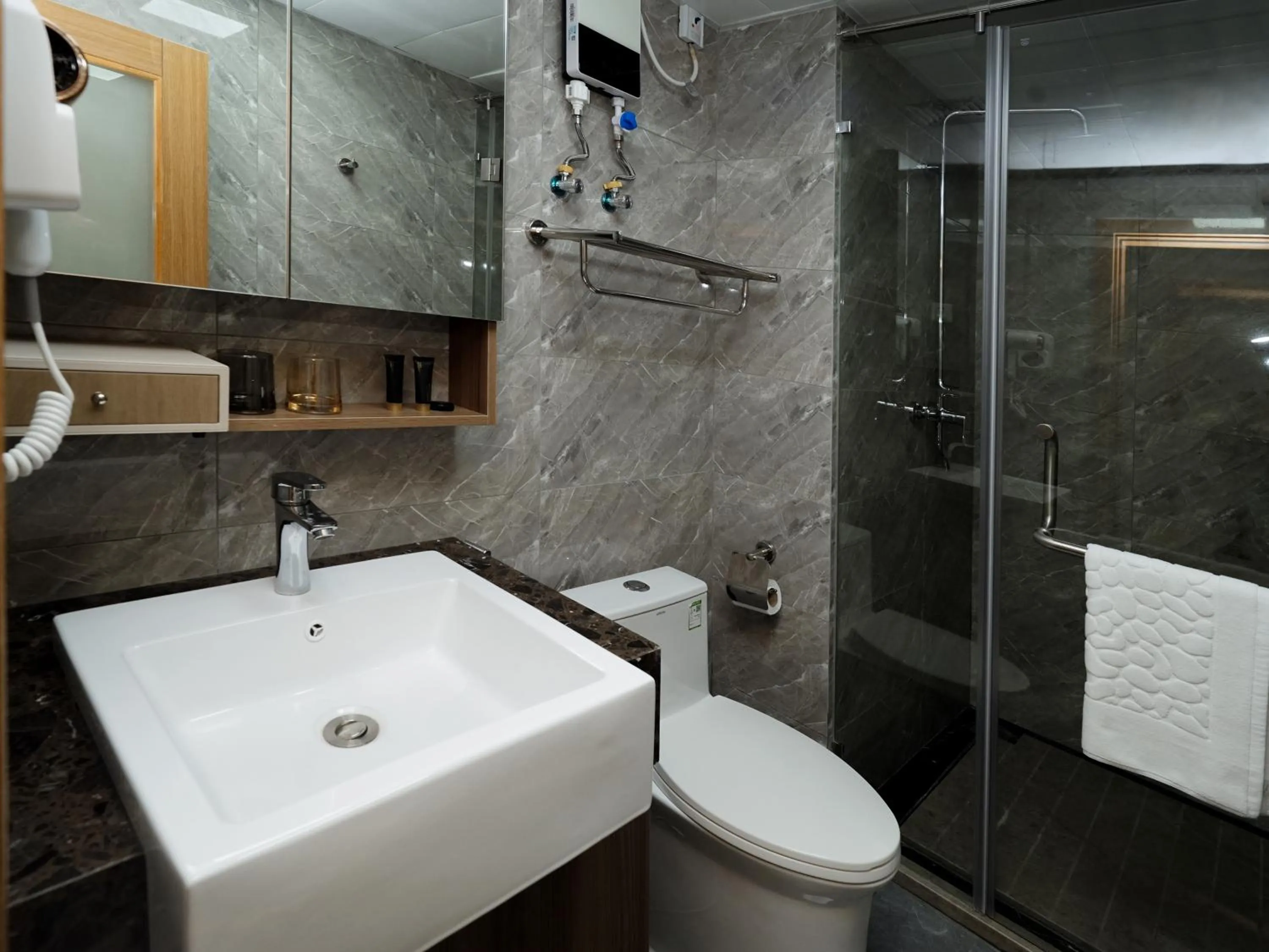 Shower in X One Hotel