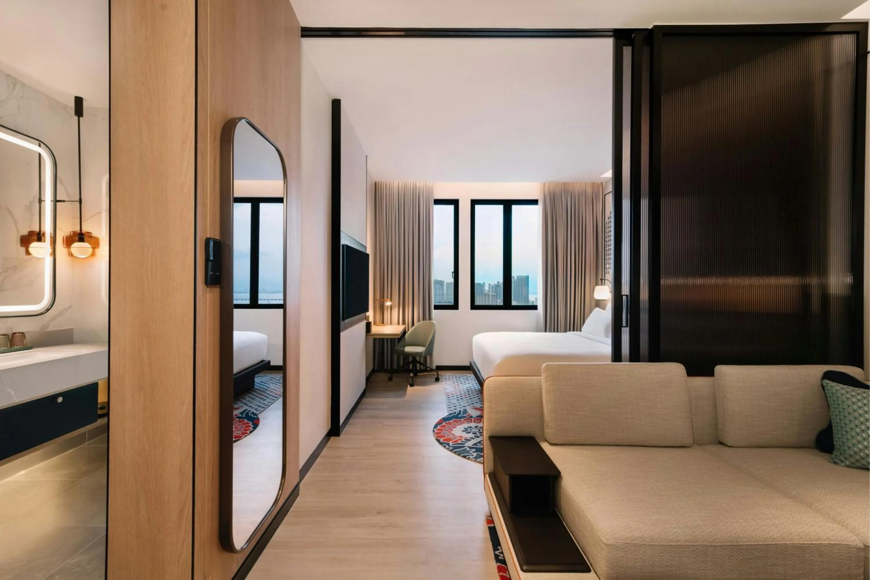 Living room, Bed in Iconic Marjorie Hotel, Penang, a Tribute Portfolio Hotel