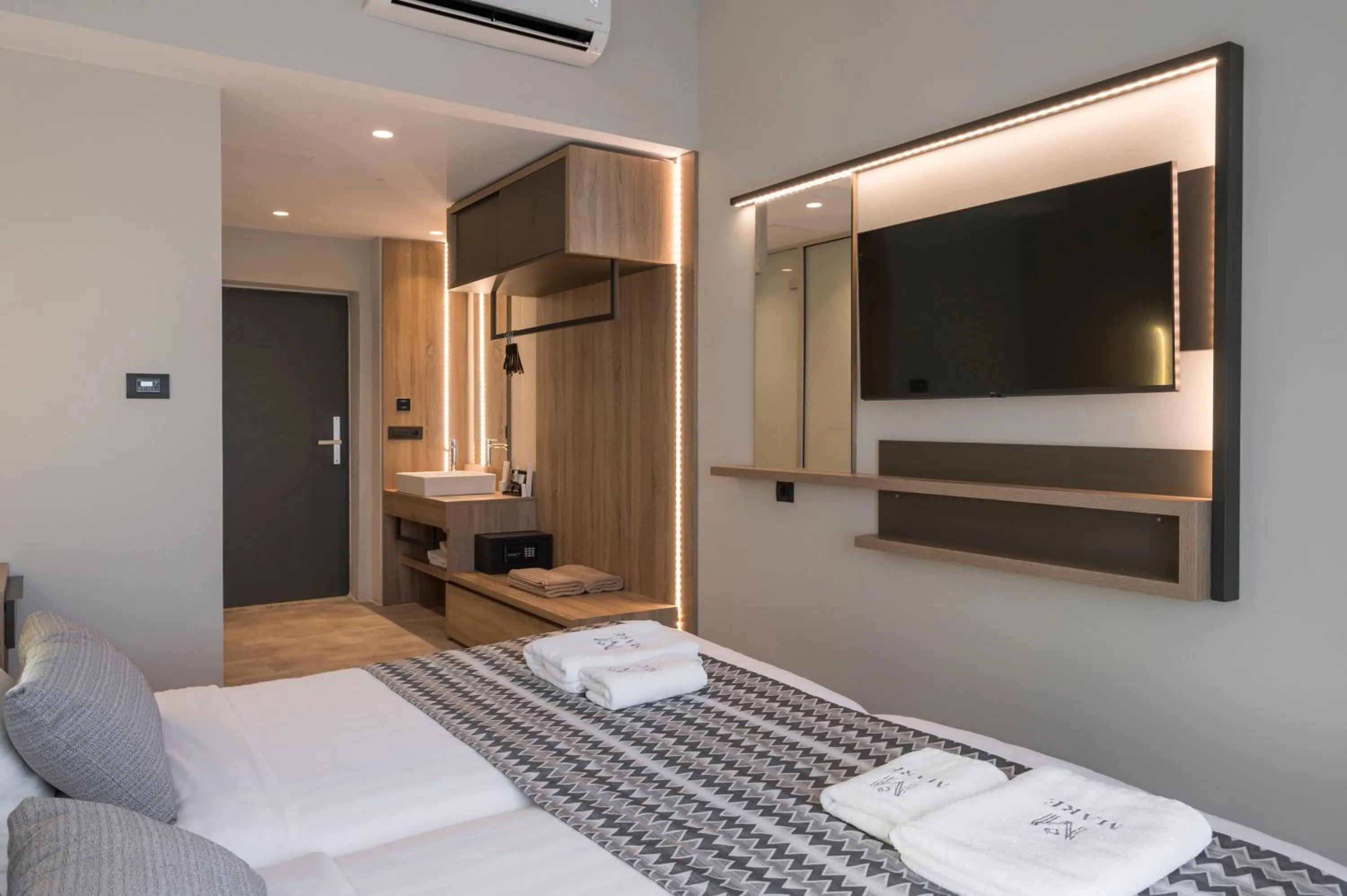 Bed in Mare Village Hotel