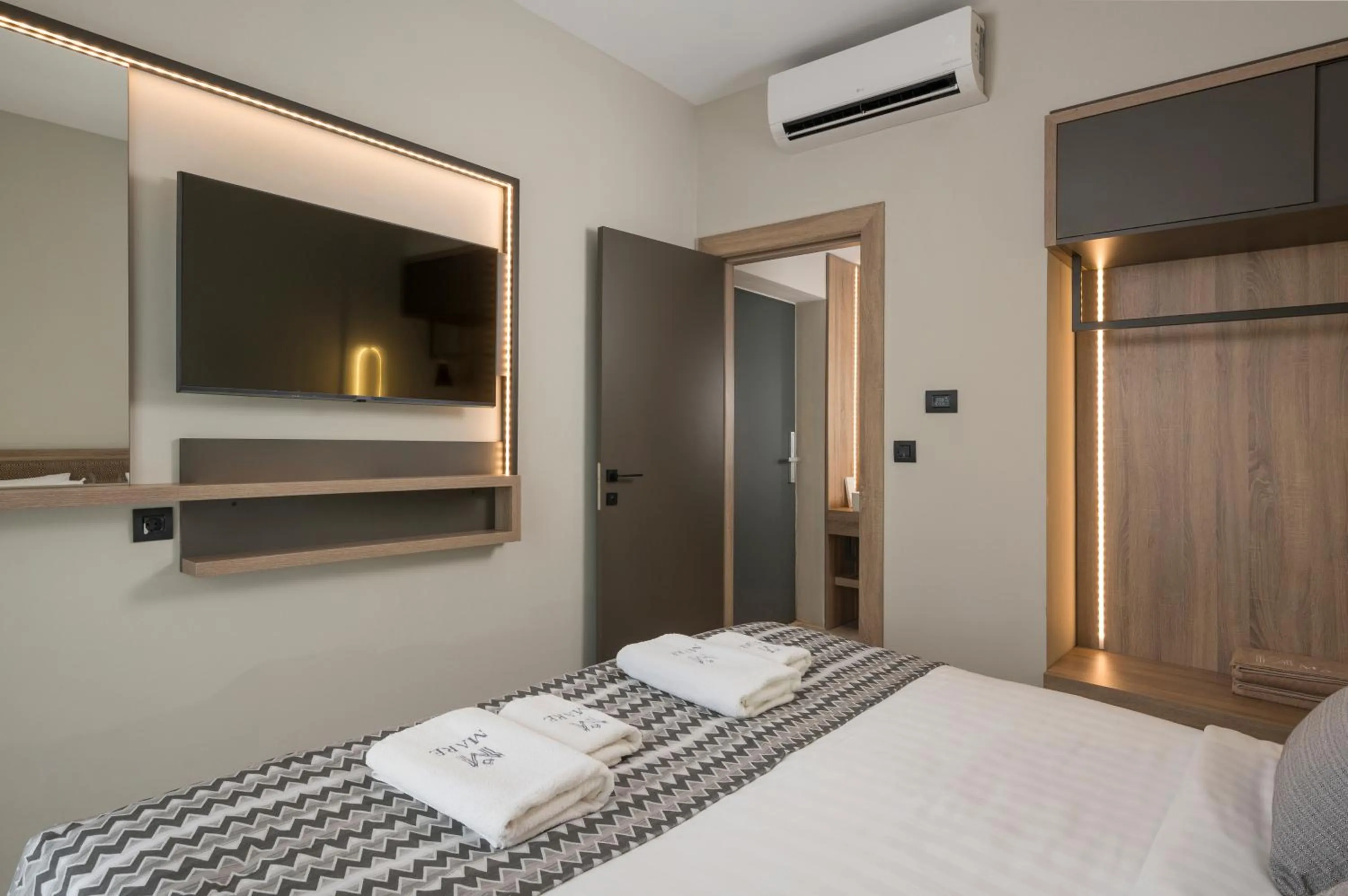 Bed in Mare Village Hotel