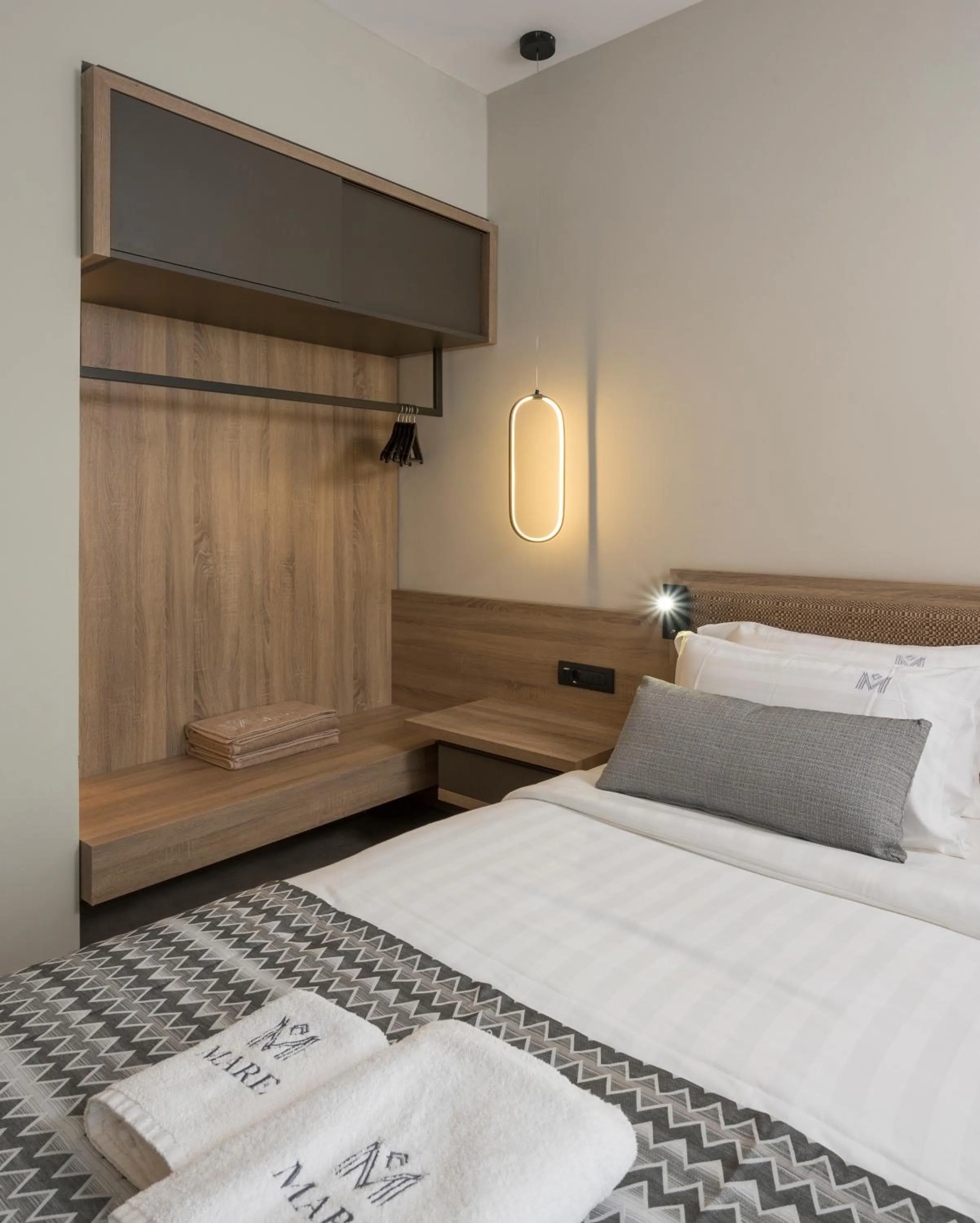 Bed in Mare Village Hotel