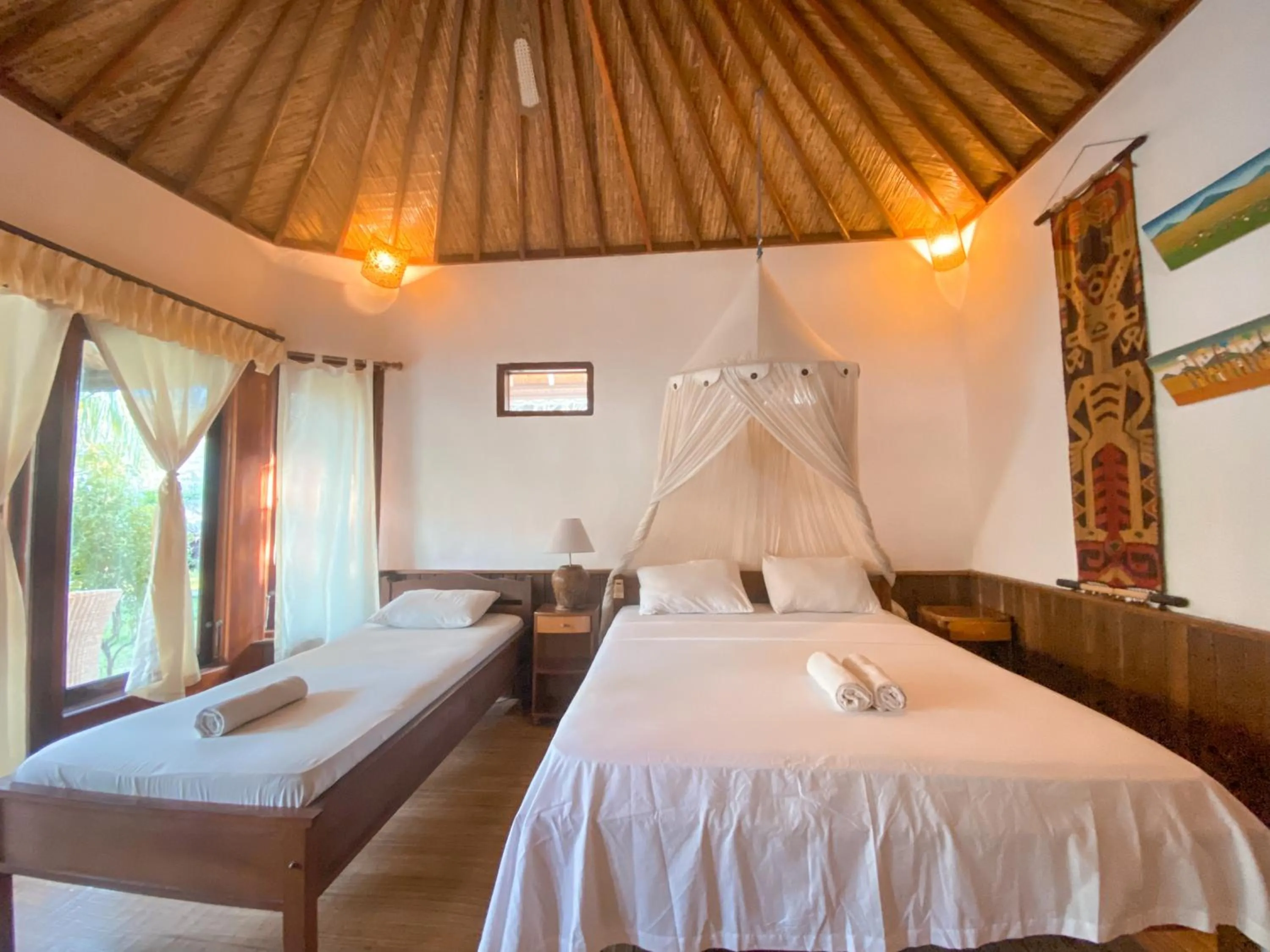 Bed in Sejuk Cottages