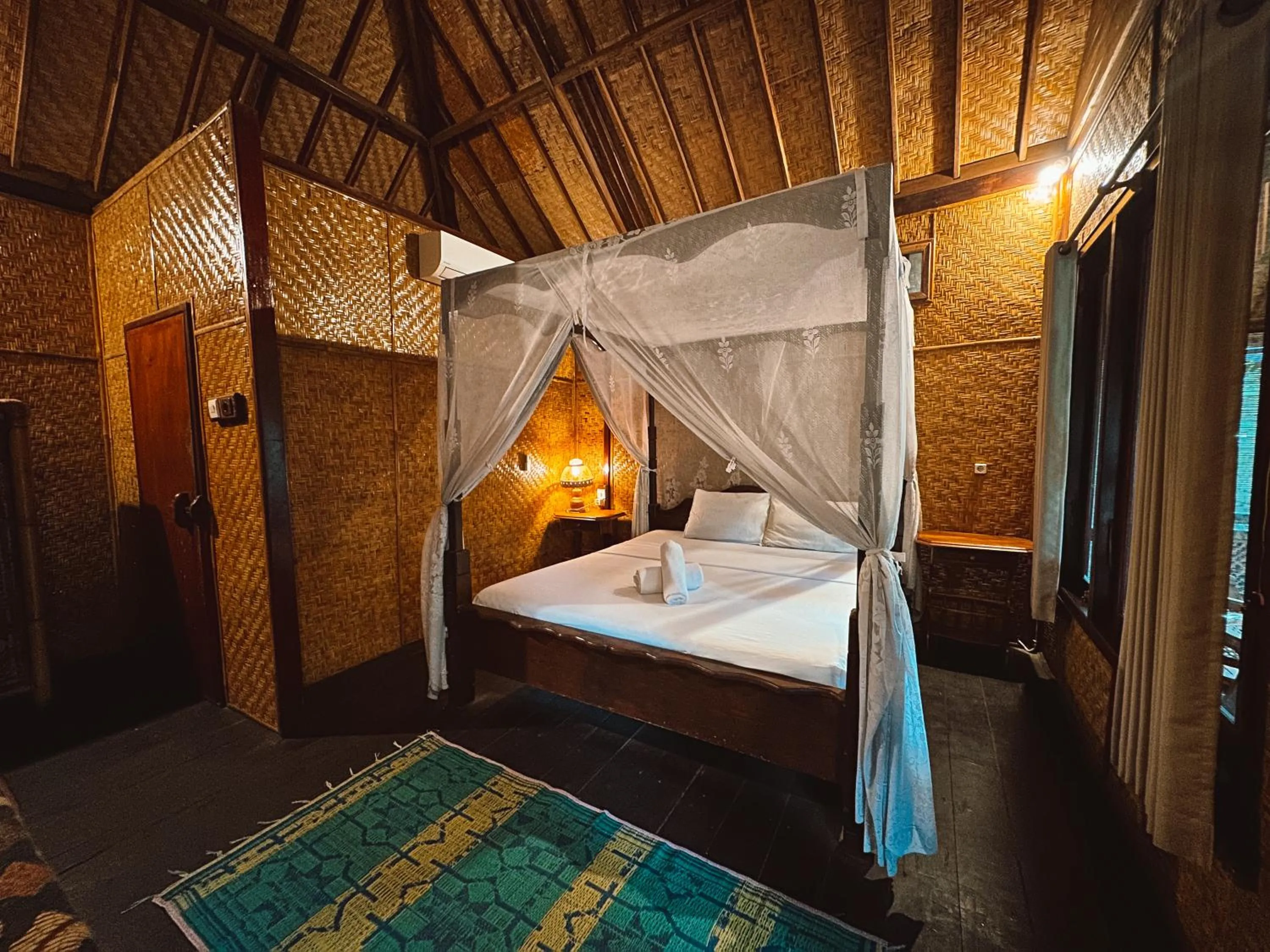 Bed in Sejuk Cottages