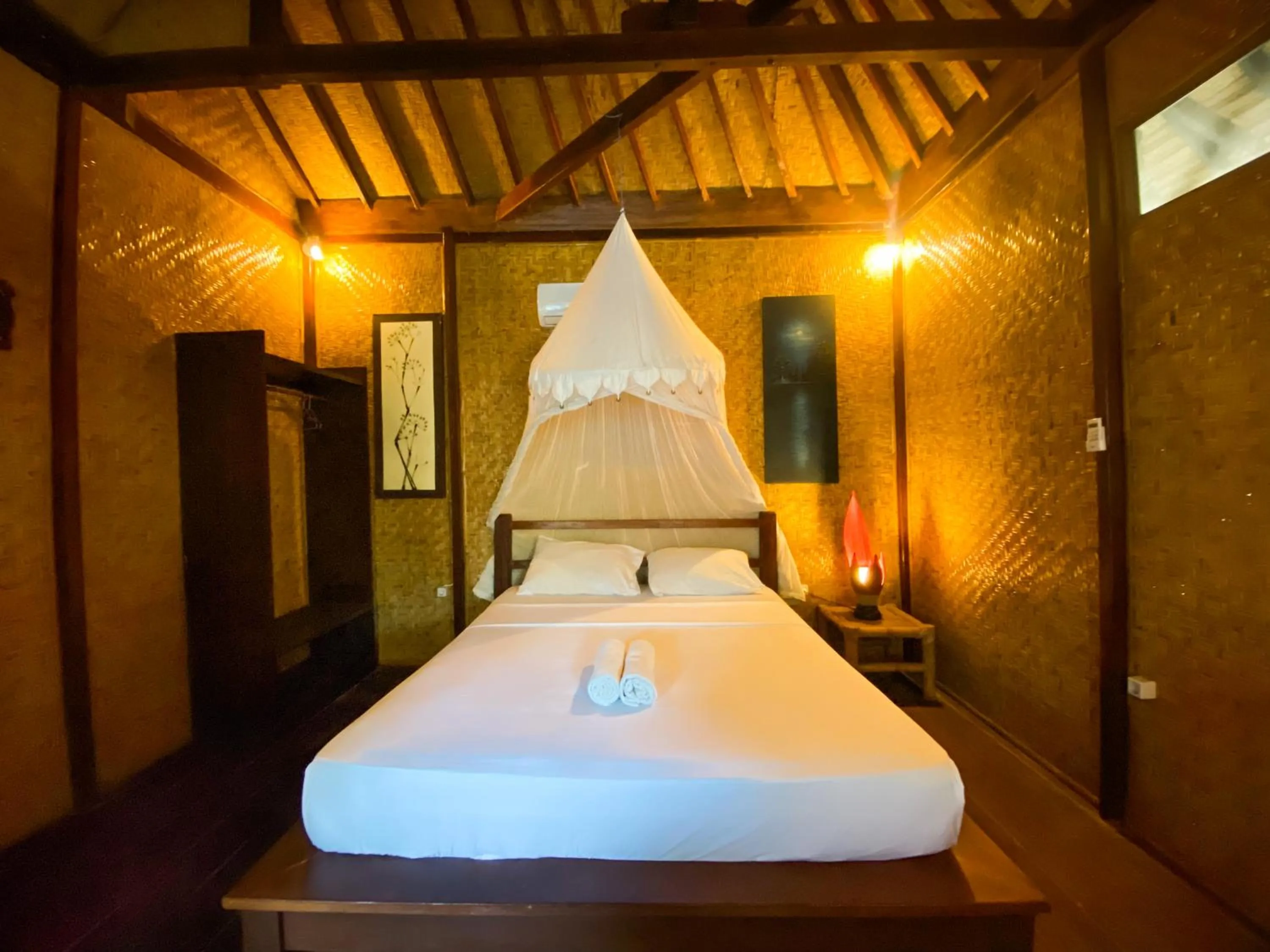 Bed in Sejuk Cottages