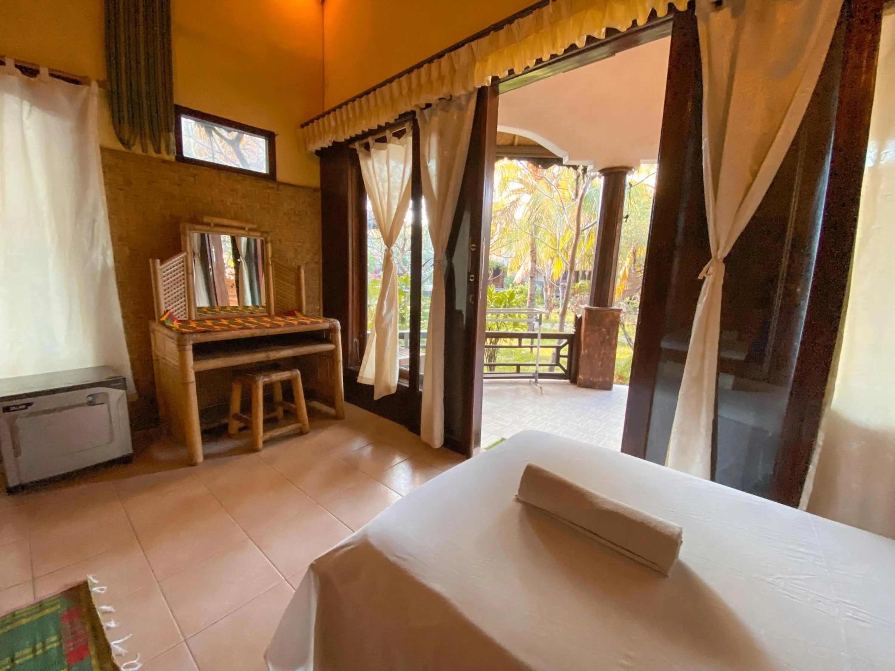 Bed in Sejuk Cottages