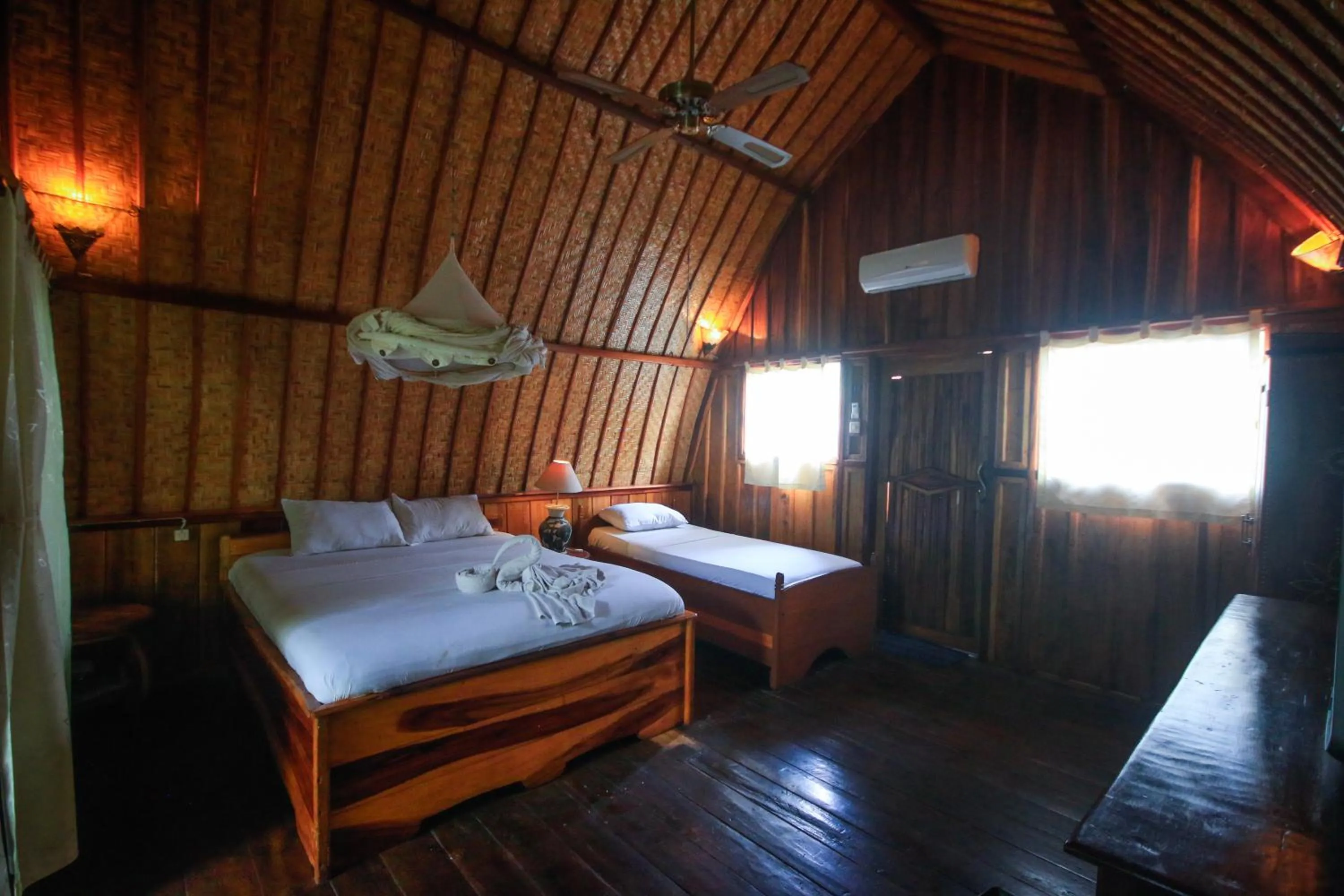 Bed in Sejuk Cottages