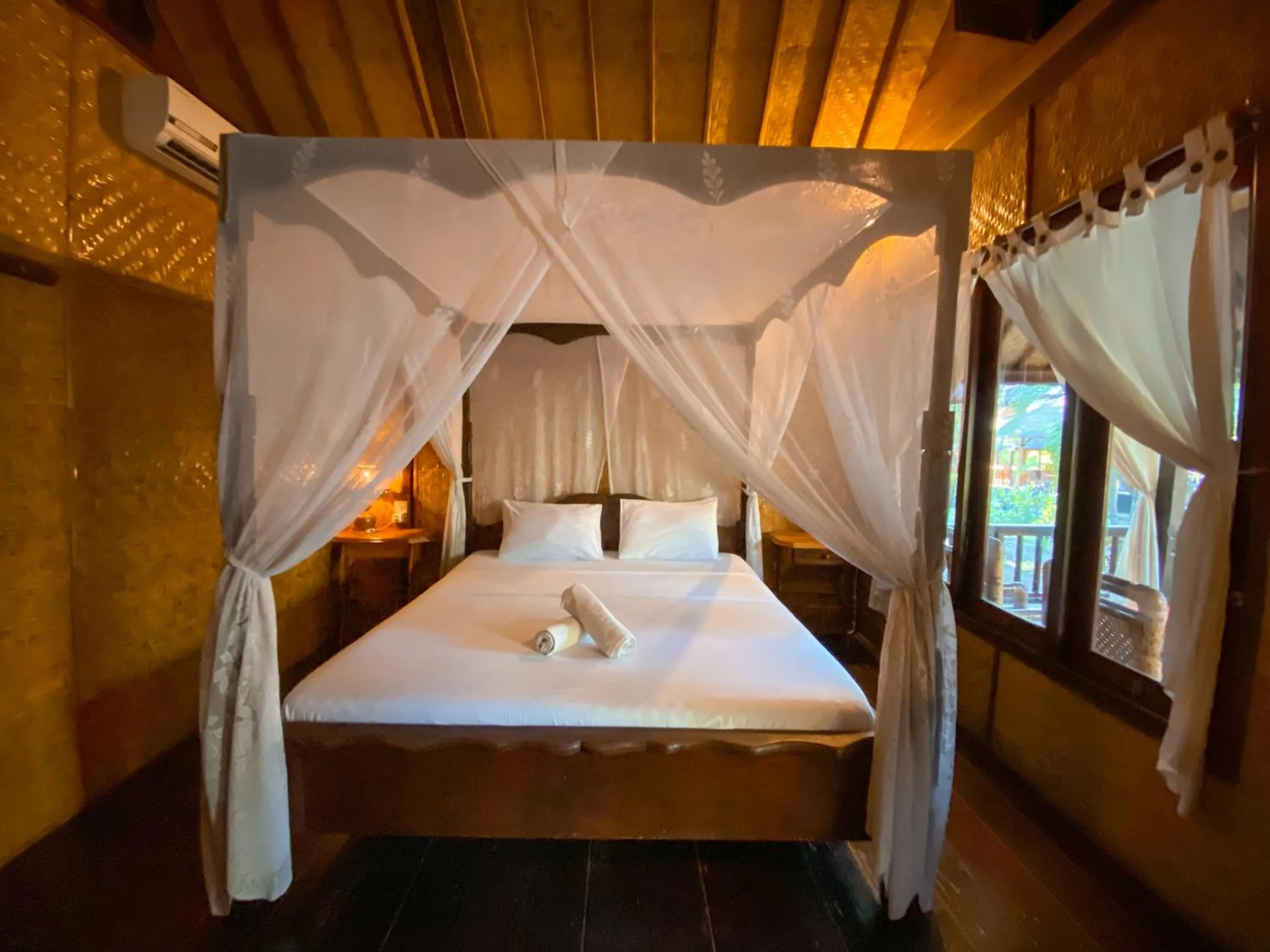 Bed in Sejuk Cottages