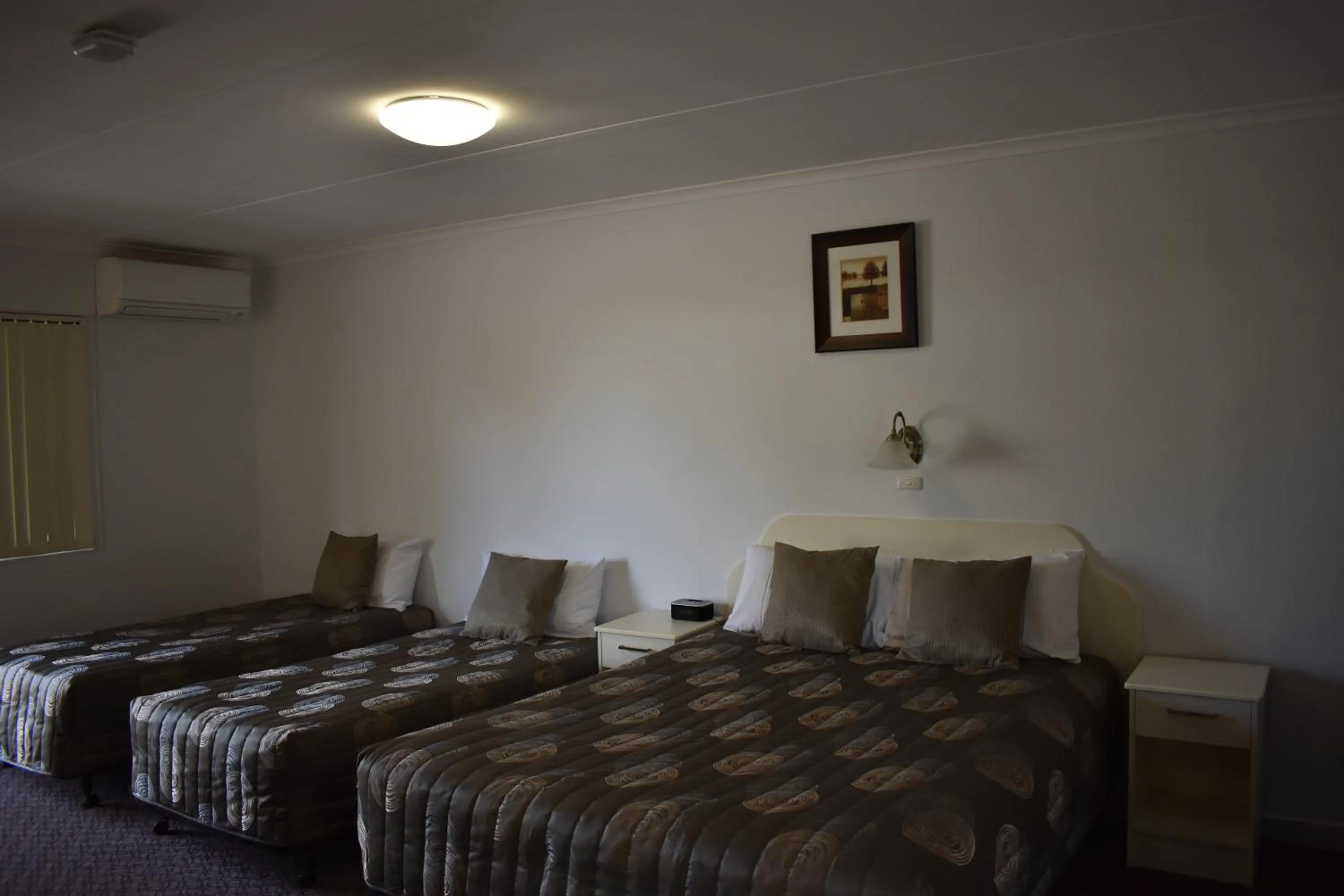 Bed in Roundhouse Motel