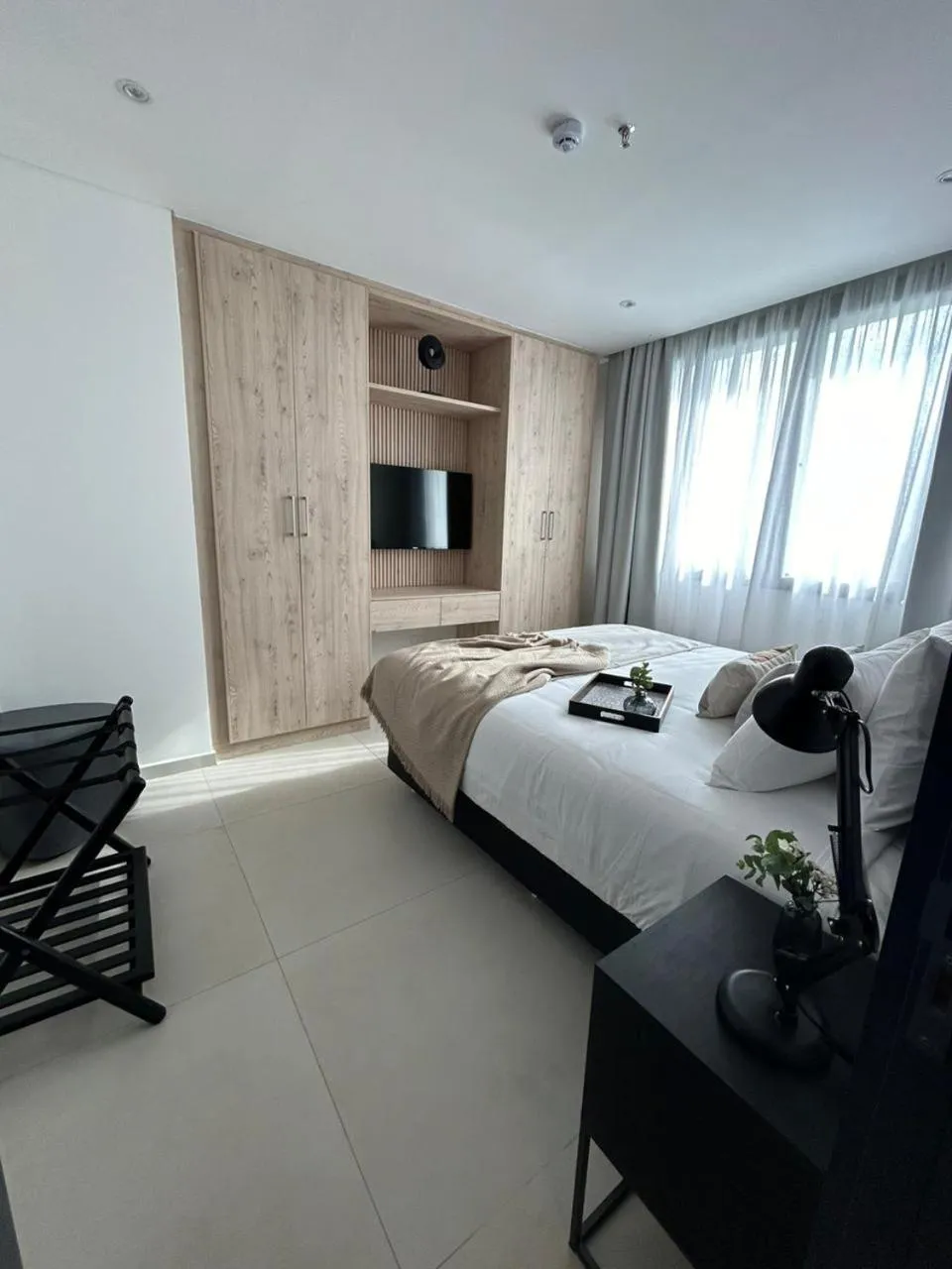 Bed in Divina Tower Apart Hotel