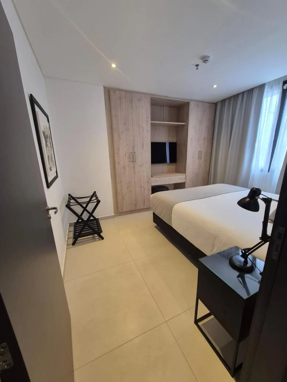 Bed in Divina Tower Apart Hotel