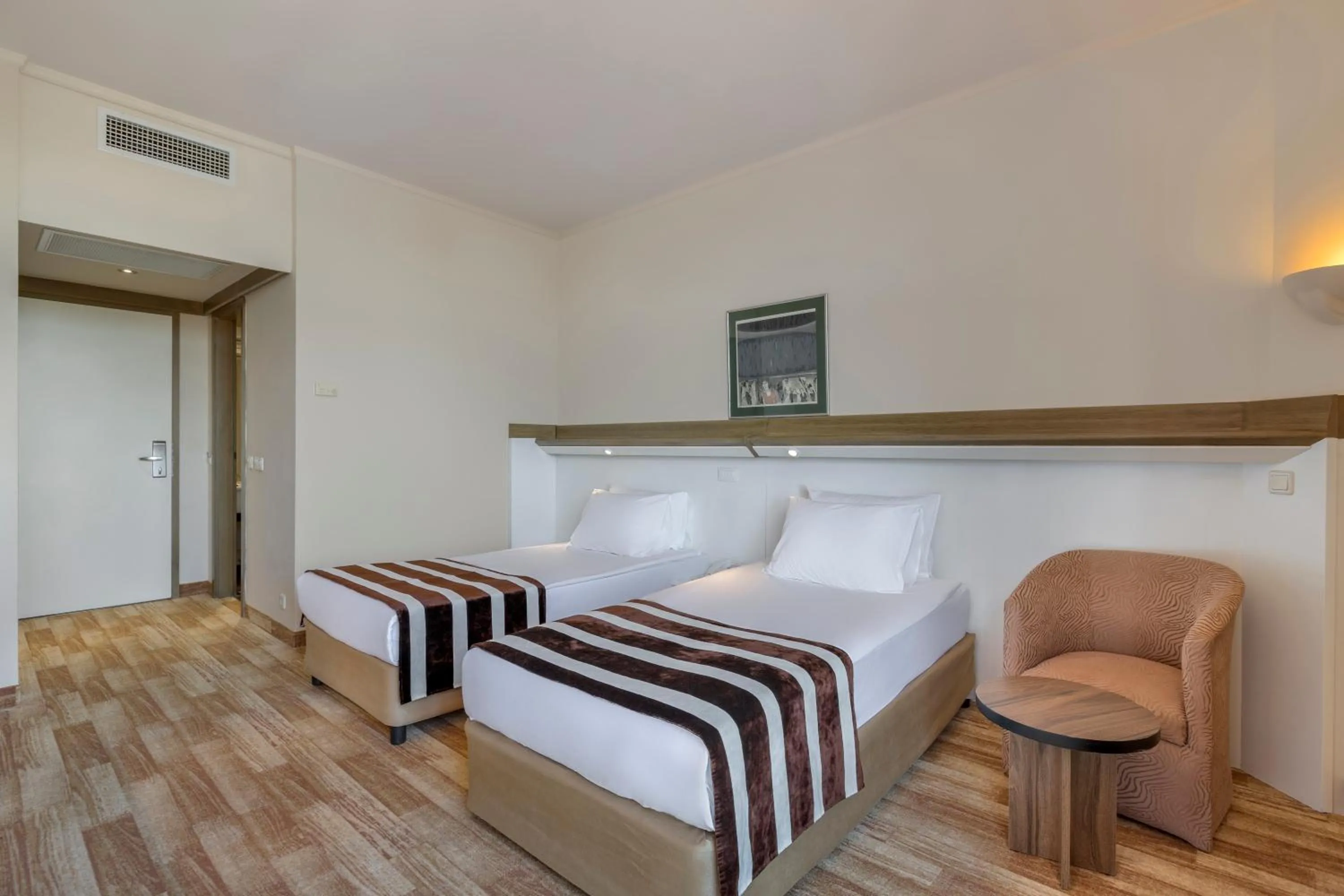 furniture, Bed in Green Max Hotel