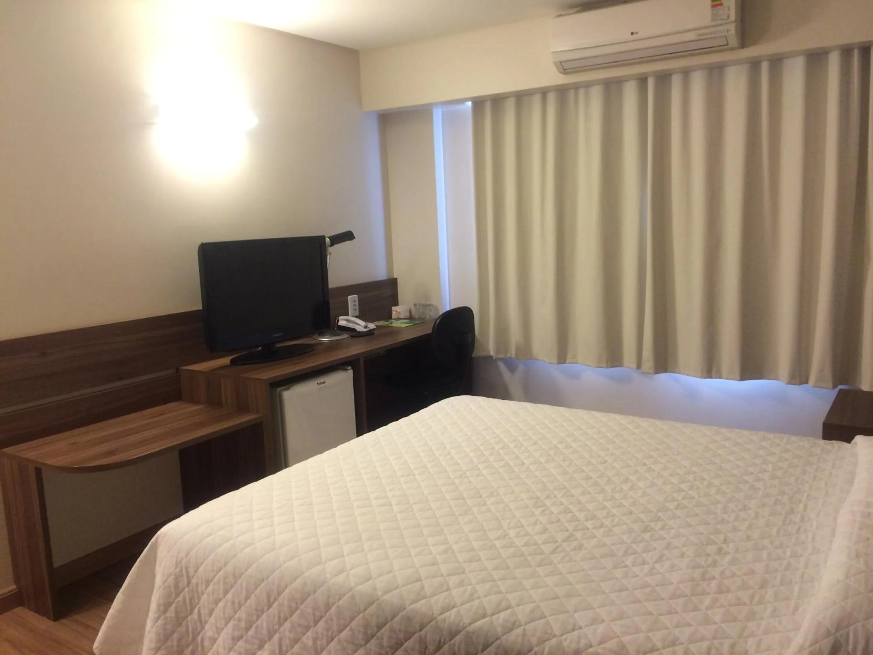Photo of the whole room, Bed in Mogano Business Hotel- ELETROPOSTO