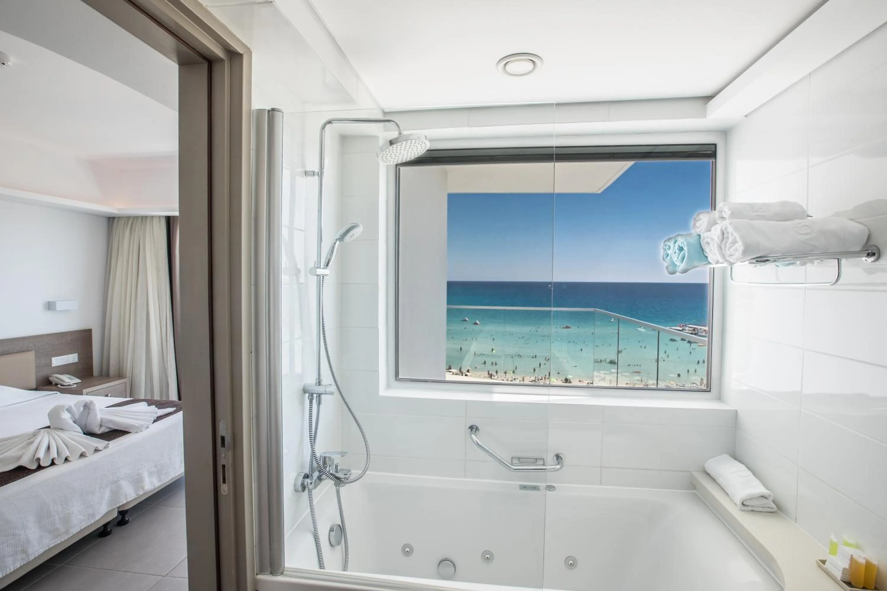 Bathroom, Bed in Vassos Nissi Plage Hotel & Spa