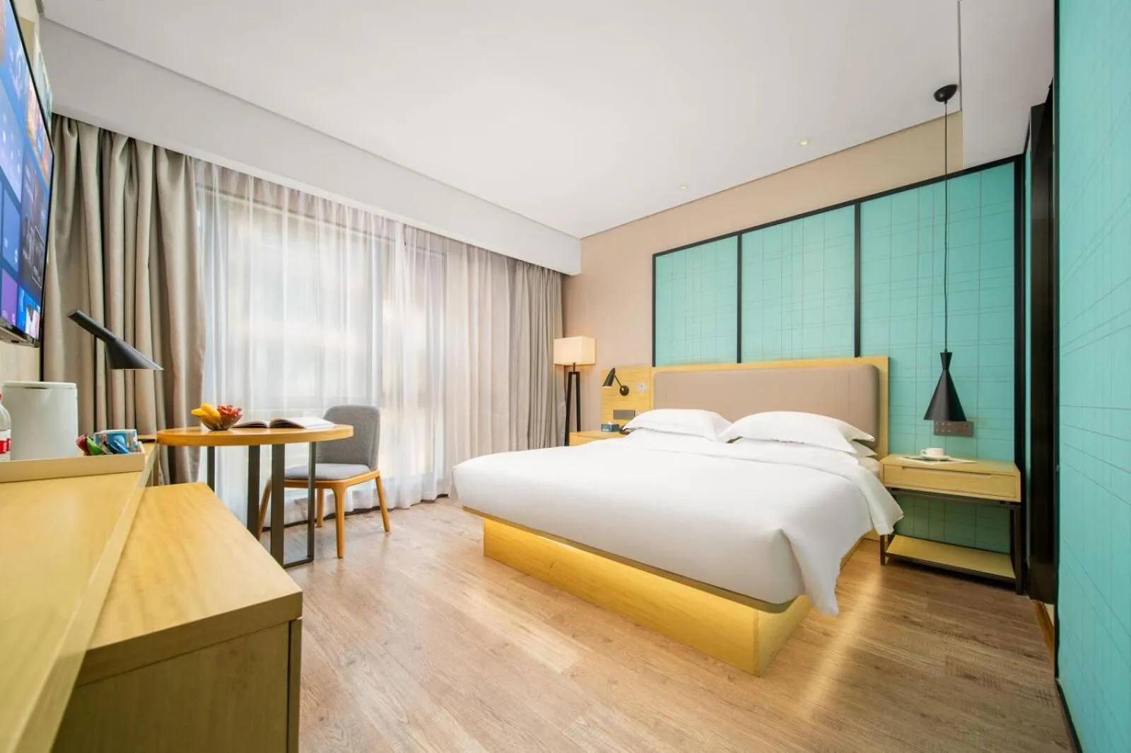 Photo of the whole room, Bed in Echarm Hotel Kunming Changshui International Airport