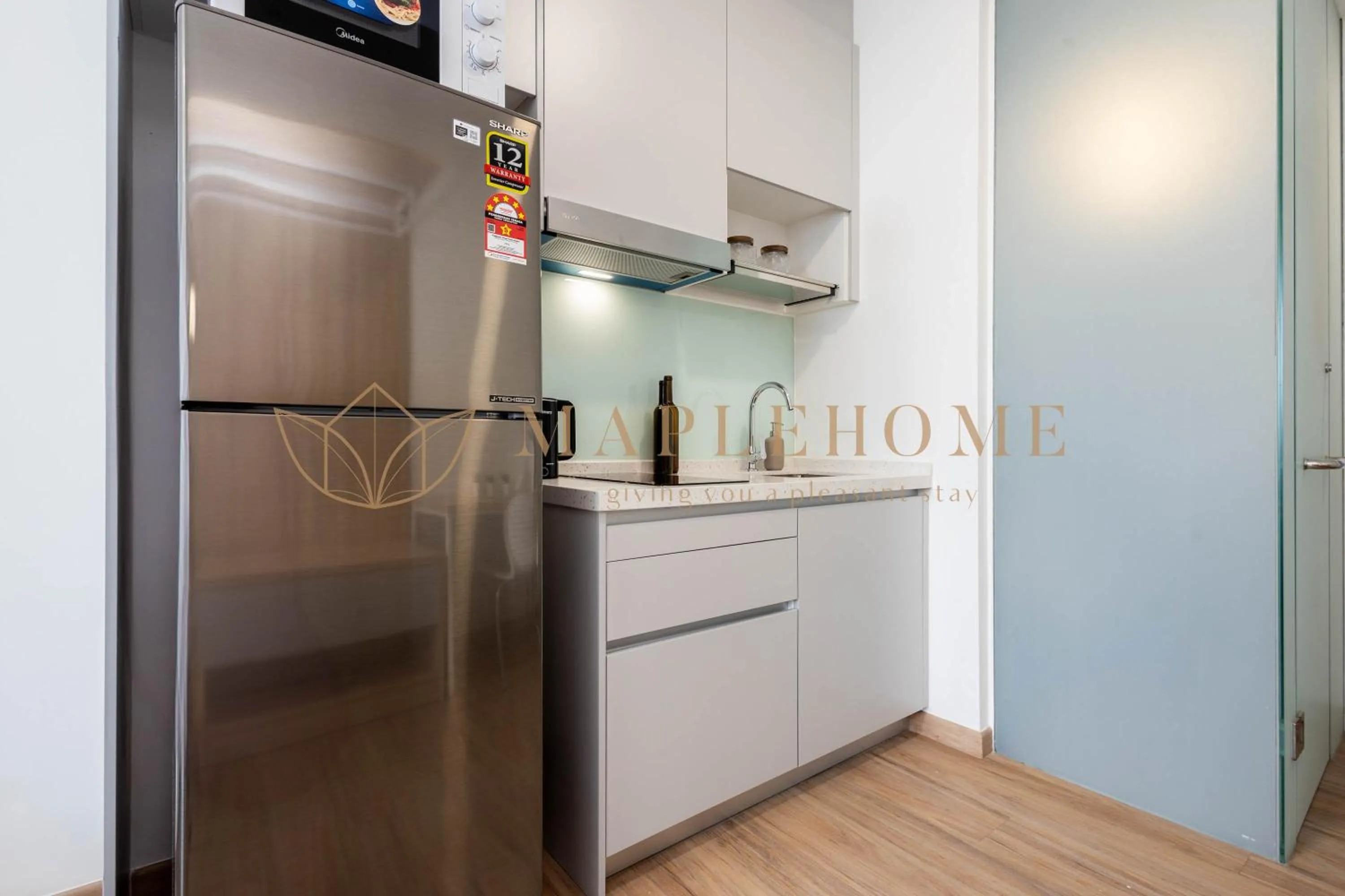 Kitchen or kitchenette in Riveria Premier Suites Kuala Lumpur