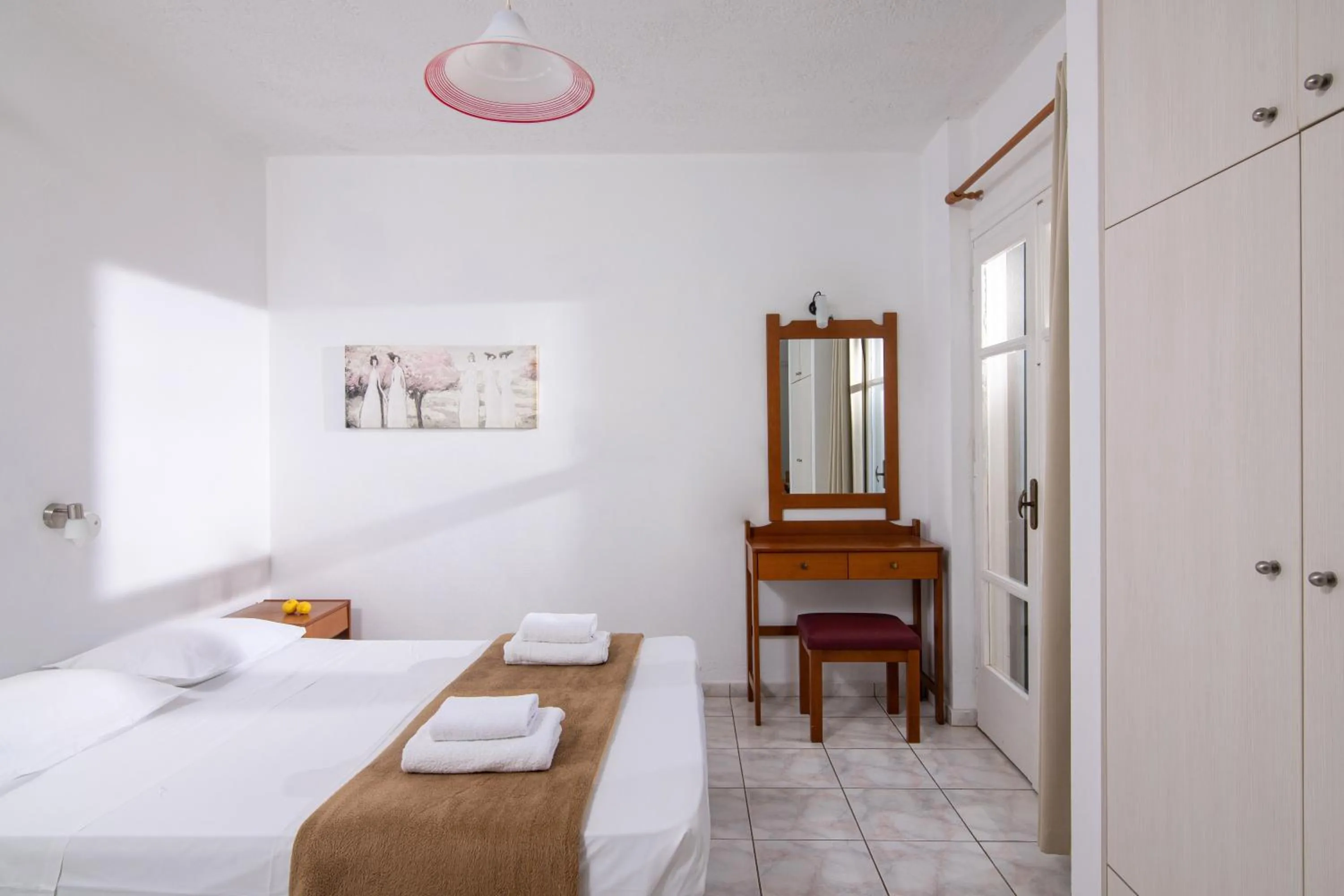 Bed in Golden Valentin Apartments