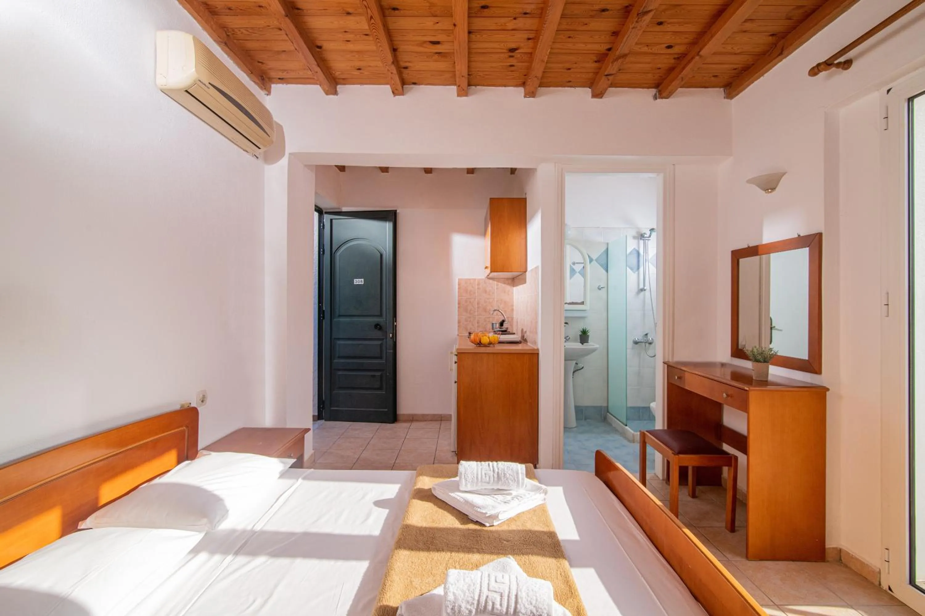 Bed in Golden Valentin Apartments