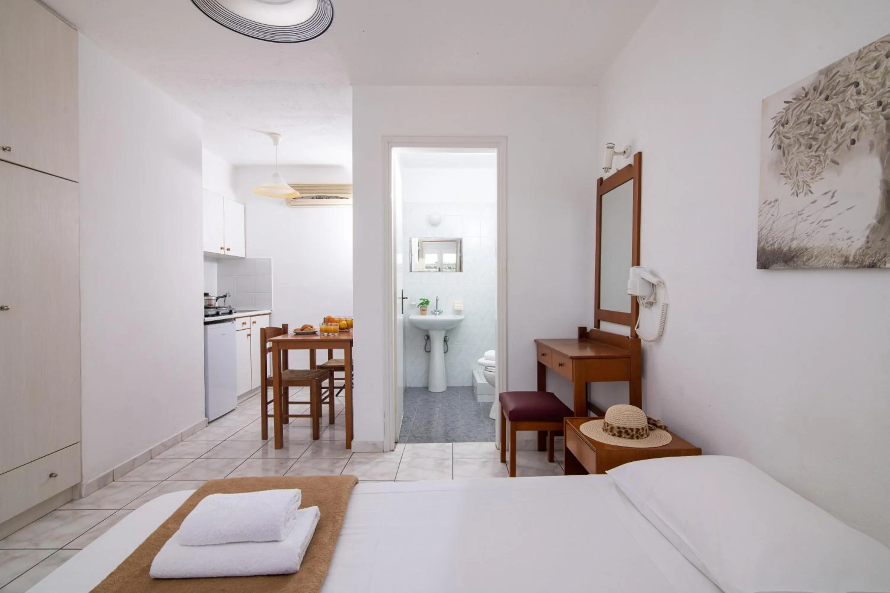 Bed in Golden Valentin Apartments