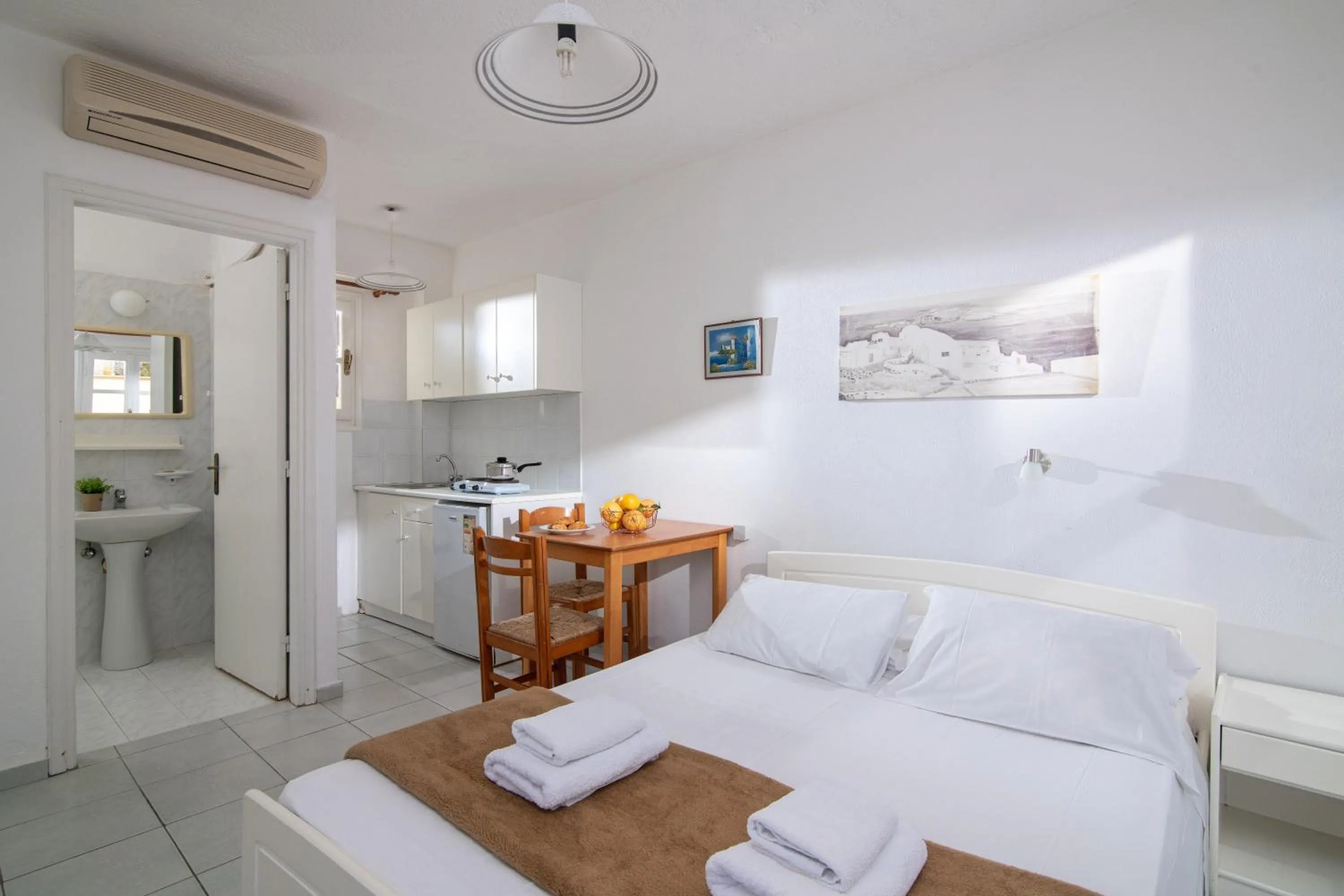 Bed in Golden Valentin Apartments