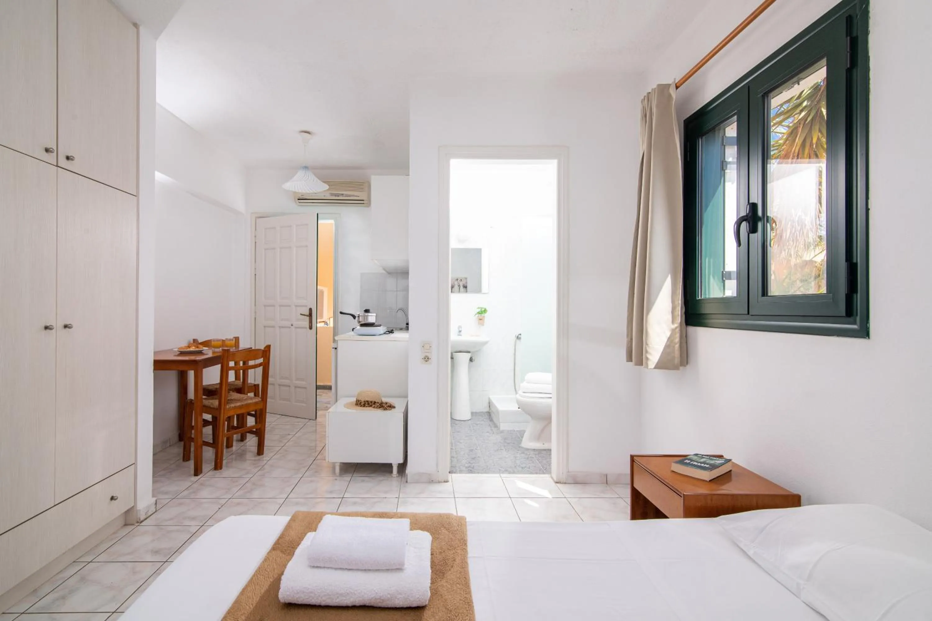 Bed in Golden Valentin Apartments