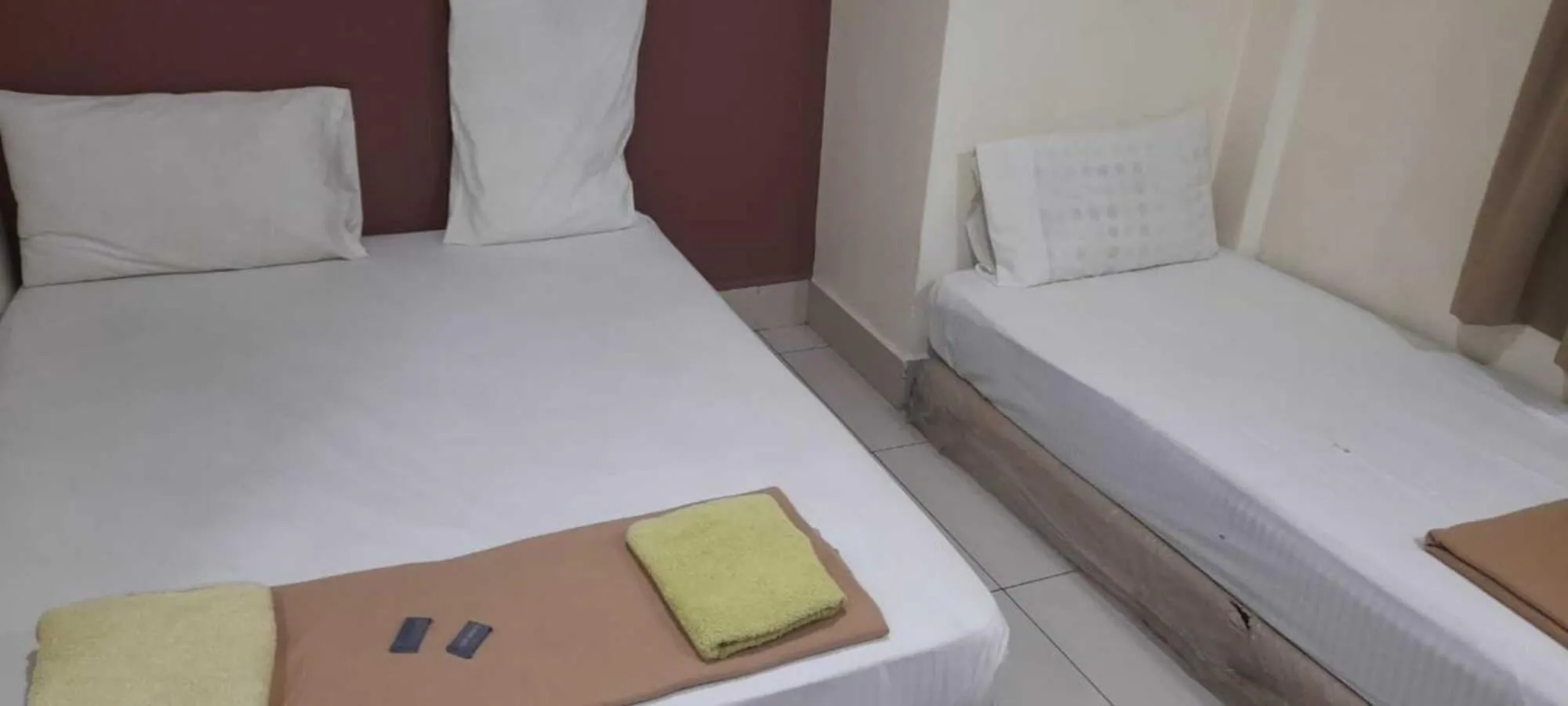 Bed in SV Andalas Hotel